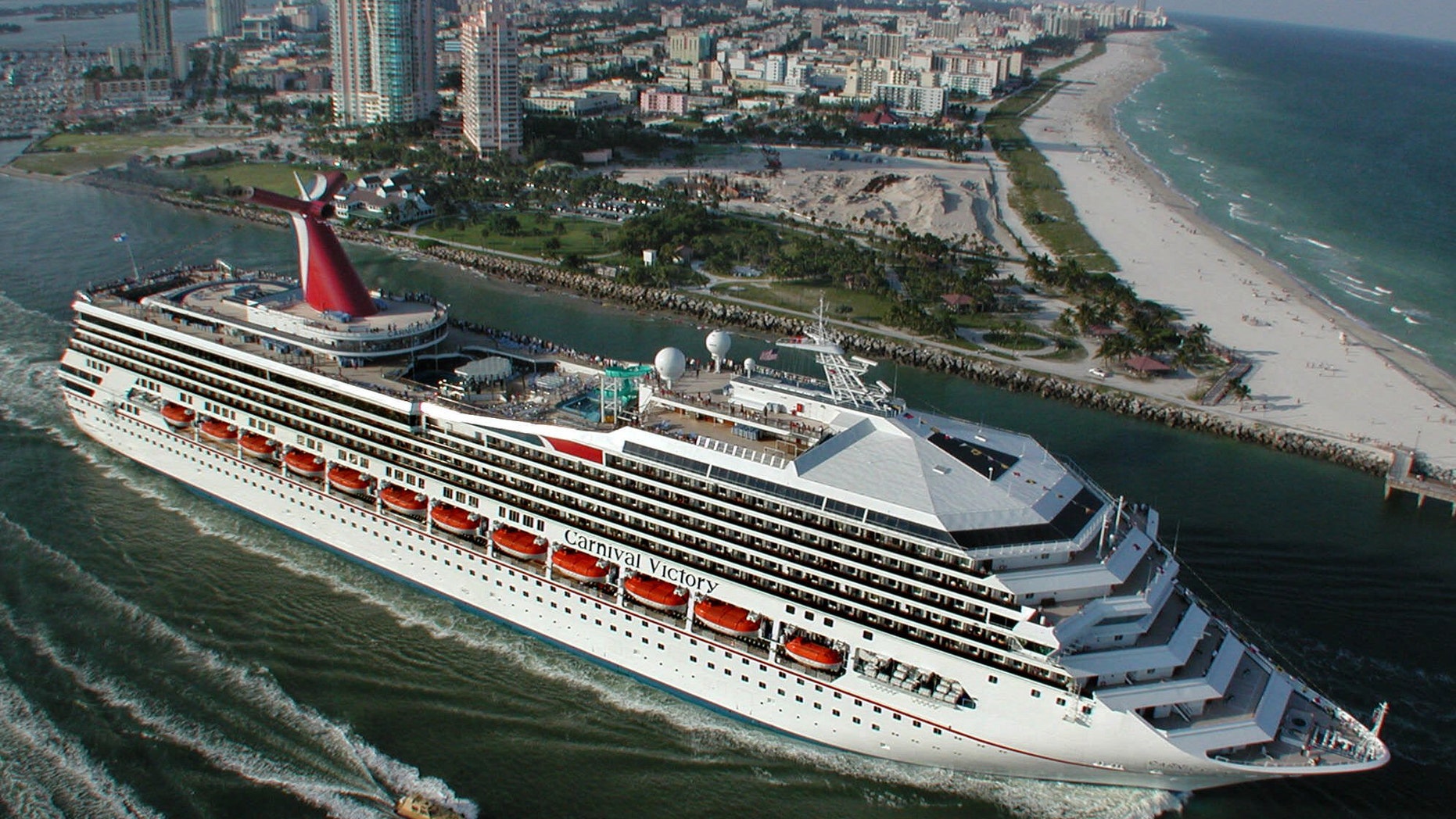 Oct. 15, 2000 - FILE photo: Carnival Cruise Lines ship, the 2,758-passenger Carnival Victory, passes by Miami Beach as it embarks on its inaugural Caribbean voyage. A 6-year-old boy drowned in one of the pools aboard a Carnival ship while at sea, the company said in a statement Monday.