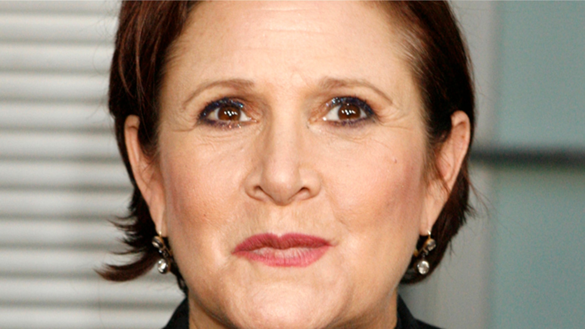 Actress Carrie Fisher arrives for the premiere of her new film "Sorority Row" in Hollywood, California September 3, 2009.
