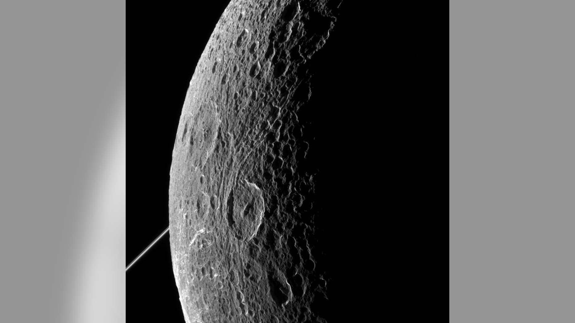NASA's Cassini imaging scientists processed this view of Saturn's moon Dione, taken during a close flyby on June 16, 2015.