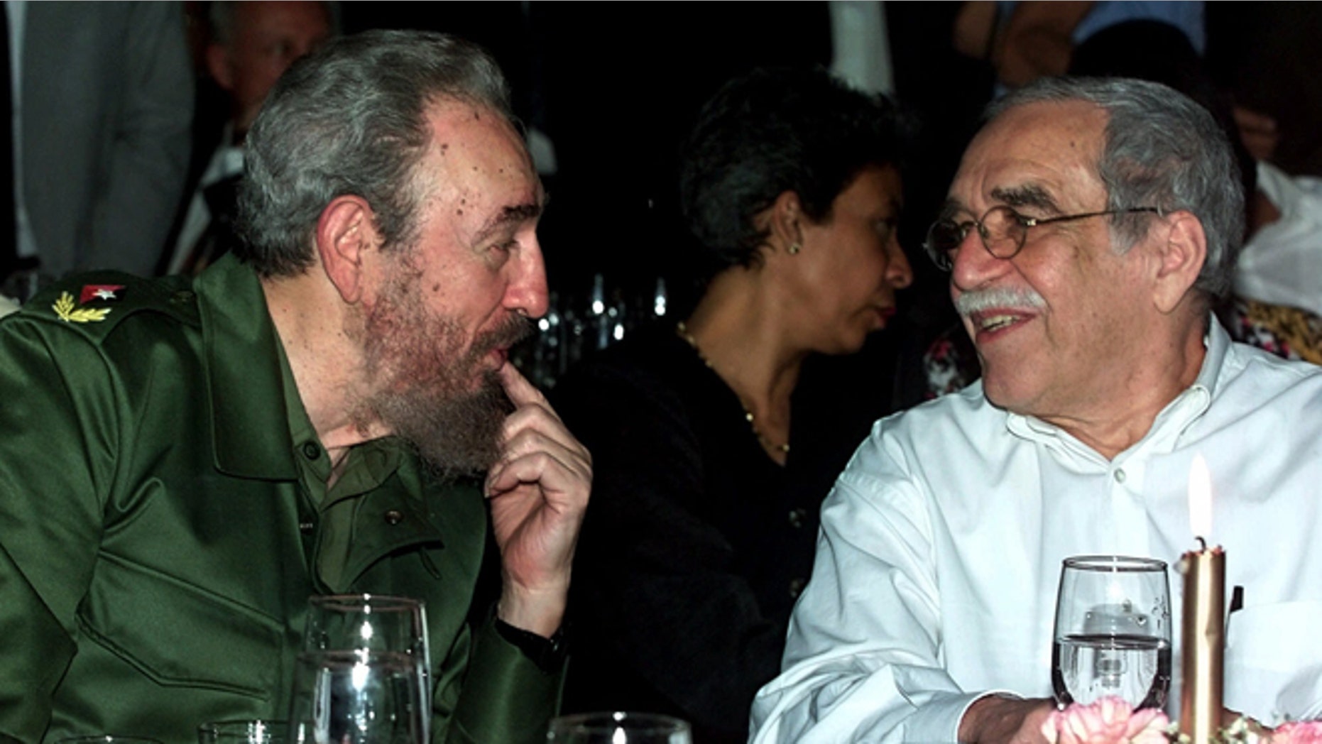 FILE - In this March 3, 2000 file photo, Cuba's leader Fidel Castro, left, and Colombian Nobel laureate Gabriel Garcia Marquez speak during a dinner at the annual cigar festival in Havana, Cuba. Marquez died on Thursday, April 17, 2014 at his home in Mexico City. (AP Photo/Jose Goitia, File)