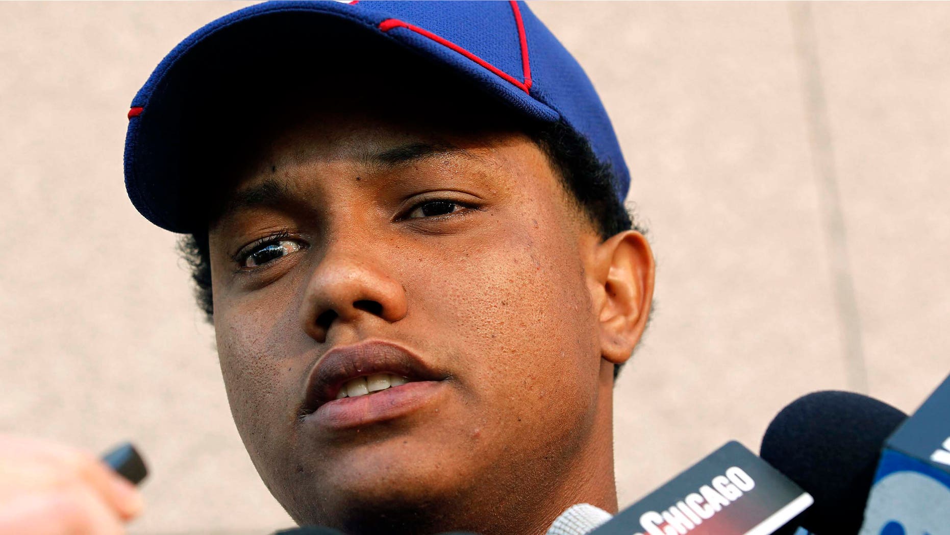 Chicago Cubs' Starlin Castro speaks to reporters about his off-the-field troubles prior to afternoon spring training baseball practice, Friday, Feb. 24, 2012, in Mesa, Ariz.