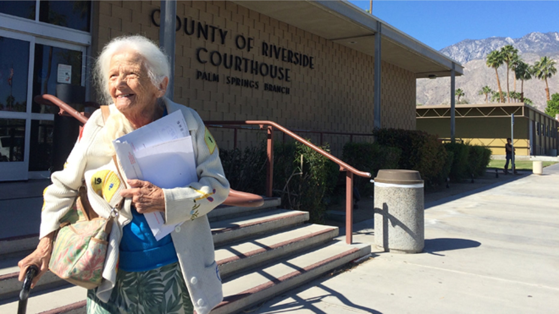 This April 1, 2016 photo Evelyn Heller, who faced eviction at the age of 100, leaves the Palm Springs courthouse after losing an eviction trial. Heller, who was evicted from her apartment, has a new home in the Southern California desert after a newspaper reported on her plight and motivational speaker Tony Robbins and a local congressman joined in helping her. (Brett Kelman/Palm Springs Desert Sun via AP) RIVERSIDE PRESS-ENTERPRISE OUT; NO SALES; NO FOREIGN; MANDATORY CREDIT
