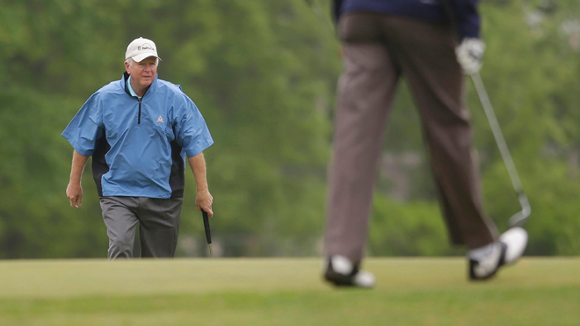 May 6, 2013: Sen. Saxby Chambliss, R-Ga., left, is seen on the golf course with President Obama at Andrews Air Force Base, Md.