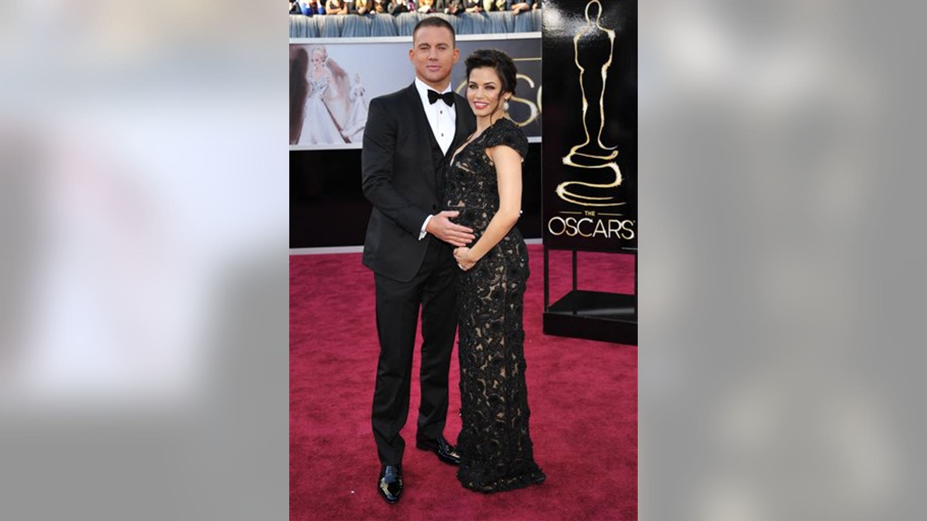 Channing Tatum, left, and Jenna Dewan-Tatum arrive at the 85th Academy Awards at the Dolby Theatre on Sunday Feb. 24, 2013, in Los Angeles. (Photo by John Shearer/Invision/AP)