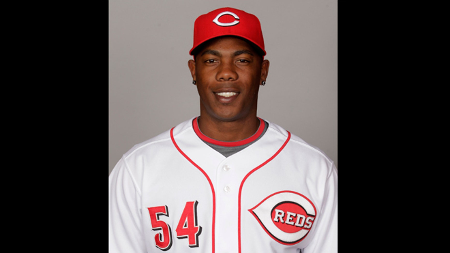 FILE - In this Feb. 25, 2012 file photo, Cincinnati Reds pitcher Aroldis Chapman is shown during spring training baseball in Goodyea, Ariz. Chapman is being sued for $18 million by a Cuban-American man imprisoned in Cuba. According to court documents, Chapman falsely accused Danilo Curbelo Garcia of involvement in human trafficking, leading to his 2008 arrest and conviction in Cuba. (AP Photo/Jae C. Hong, File)