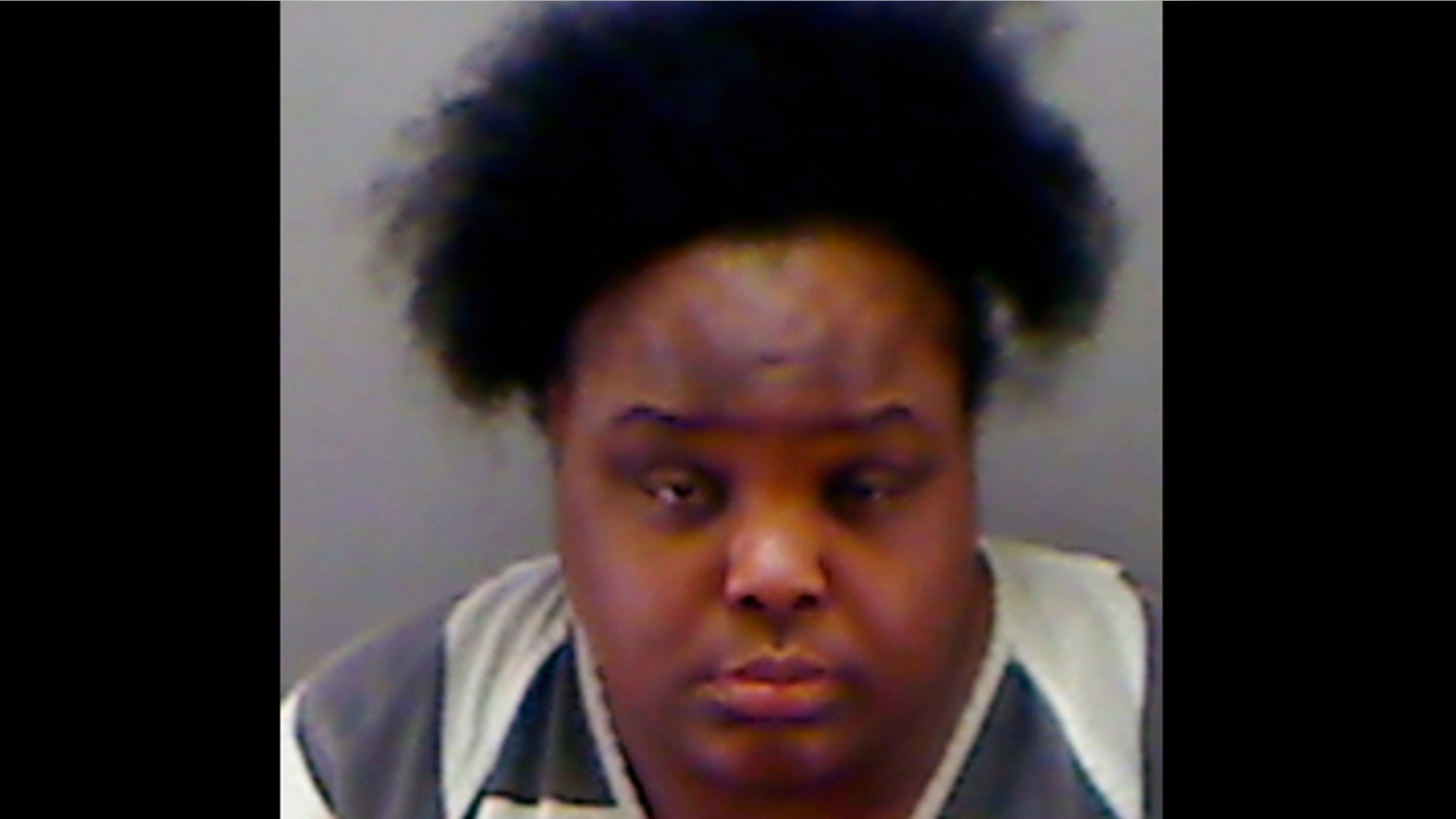 This undated booking photo provided by the Longview Police Department shows Charity Johnson. Authorities say Johnson, 34, posed as a teenager to enroll as a sophomore at a private Texas high school.
