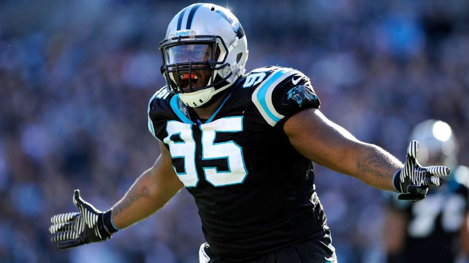 CHARLOTTE, NC - JANUARY 12: Charles Johnson #95 of the Carolina Panthers reacts after a play in the second quarter against the San Francisco 49ers during the NFC Divisional Playoff Game at Bank of America Stadium on January 12, 2014 in Charlotte, North Carolina. (Photo by Grant Halverson/Getty Images)