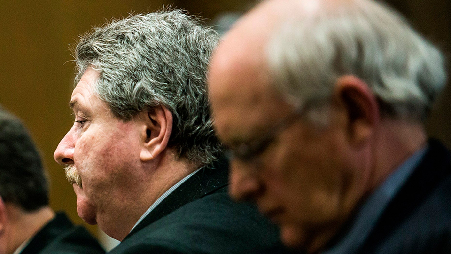Charles Pickett listens to the prosecutor retrace his steps the day Pickett crashed into a group of bicyclists during closing arguments in his murder trial, Tuesday, May 1, 2018, Kalamazoo, Mich. (Rebekah Welch /Kalamazoo Gazette-MLive Media Group via AP)