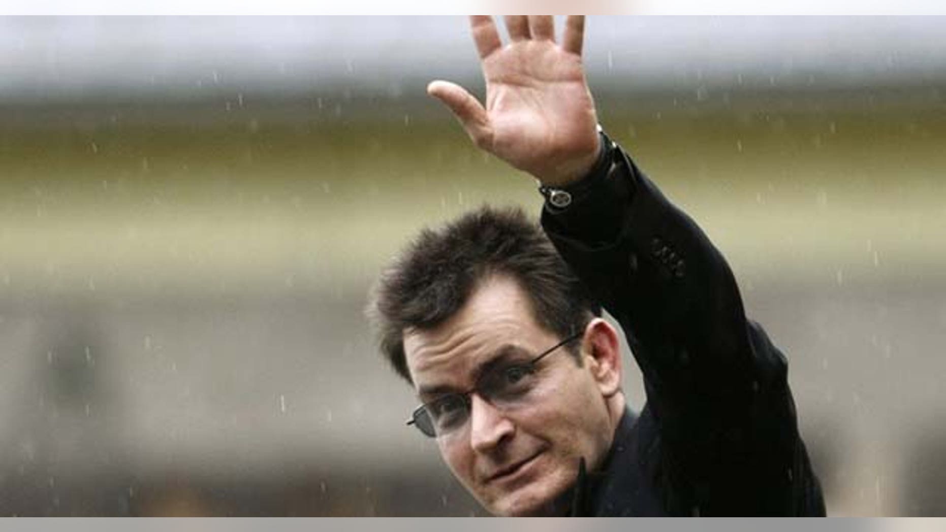 Actor Charlie Sheen gestures towards the media as he leaves the Pitkin County Courthouse after a sentencing hearing in Aspen, Colorado in this August 2, 2010 file photo.