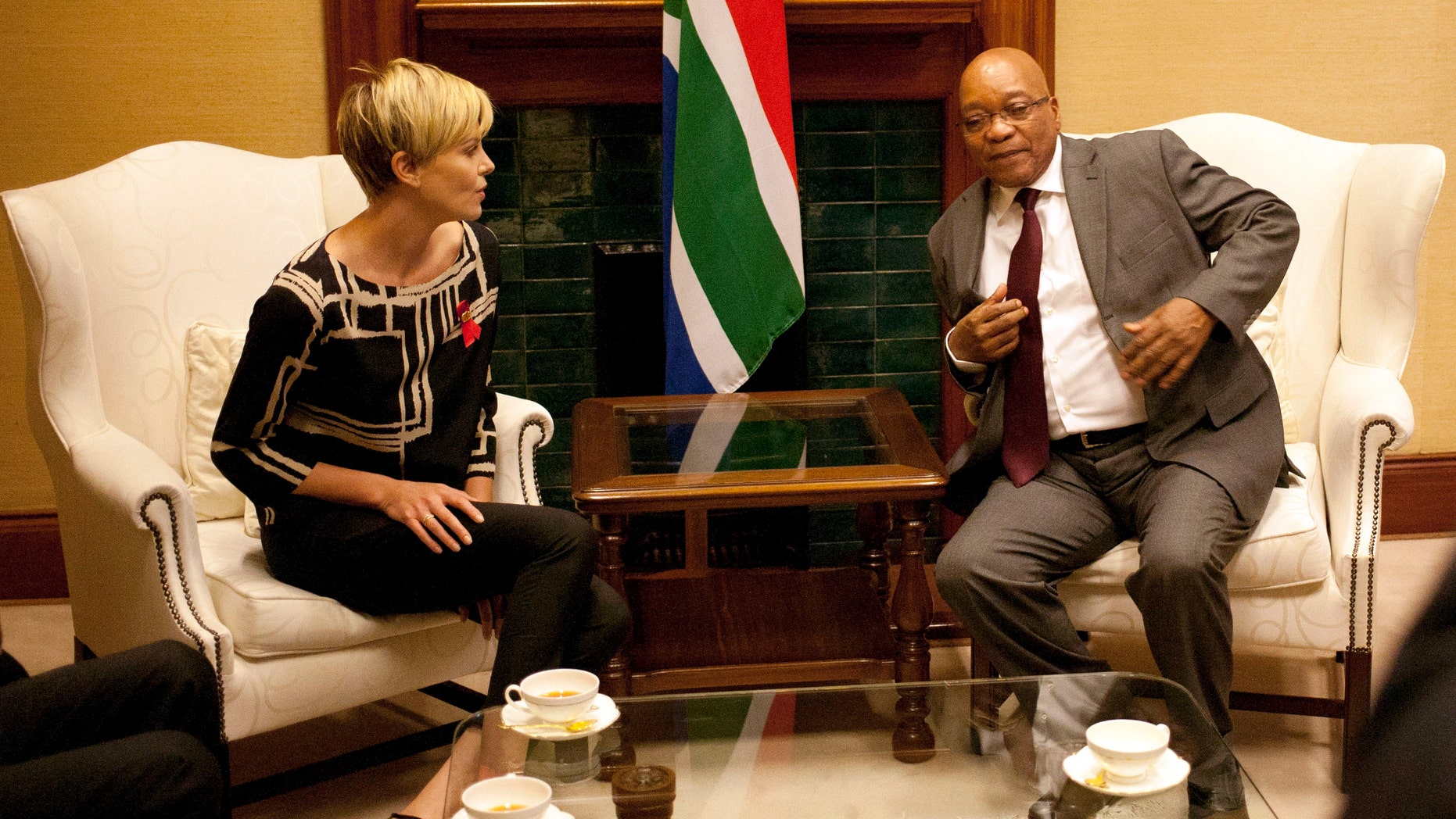 South African President Jacob Zuma, right, meets South African-born Hollywood actress Charlize Theron, left, at his Union Building office in Pretoria, South Africa, ahead of their meeting, to discuss the fight against HIV and AIDS.