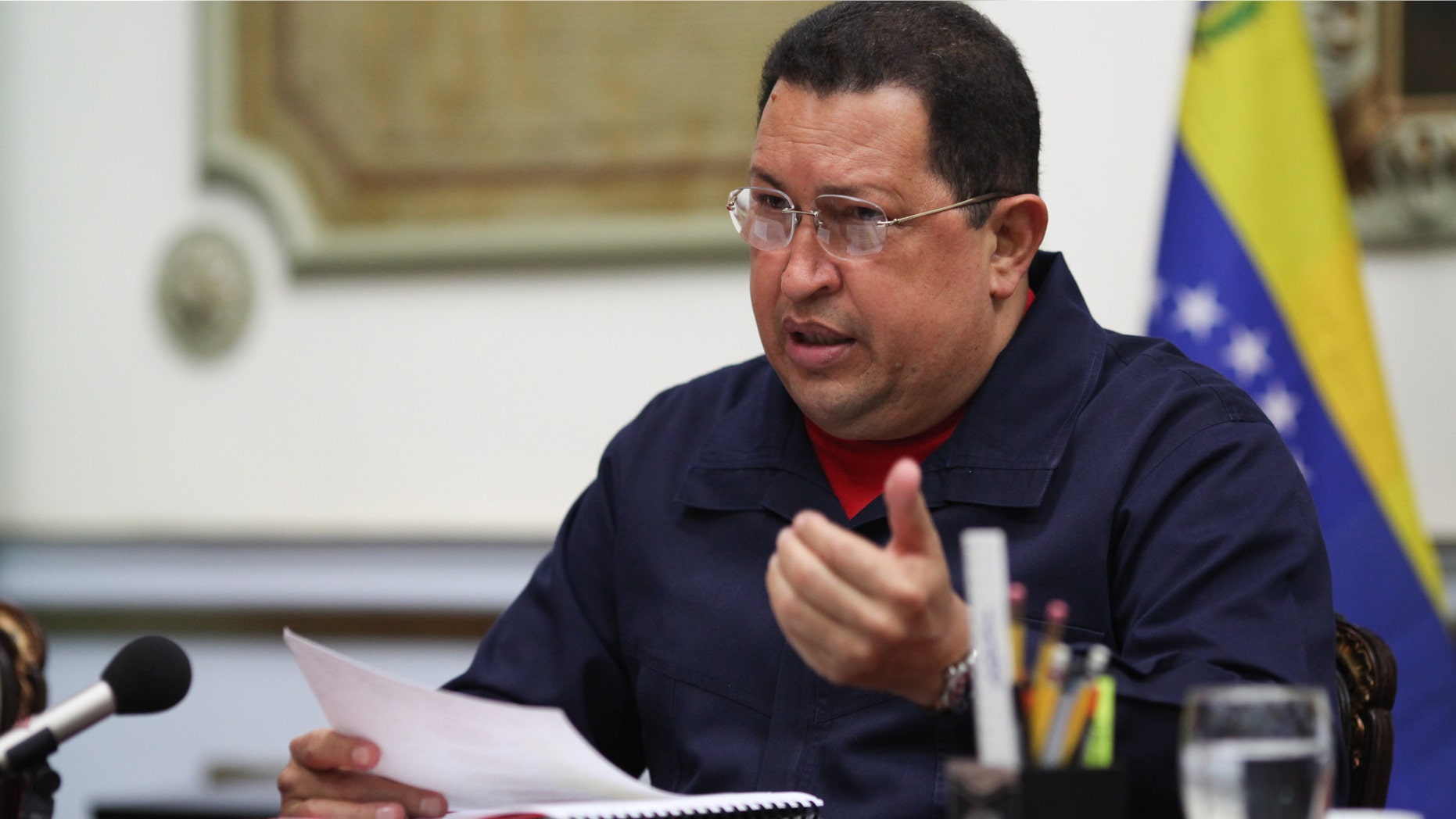 Venezuelan President Hugo Chavez, center, during a meeting with ministers, Thursday March 29, 2012. (AP Photo/Miraflores Presidential Press Office)