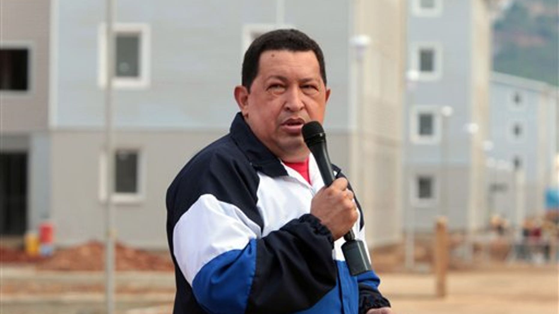 Aug. 9, 2012 - In this photo released by Miraflores Press Office, Venezuela's President Hugo Chavez speaks during a visit to a housing complex at Catia la Mar, Venezuela.