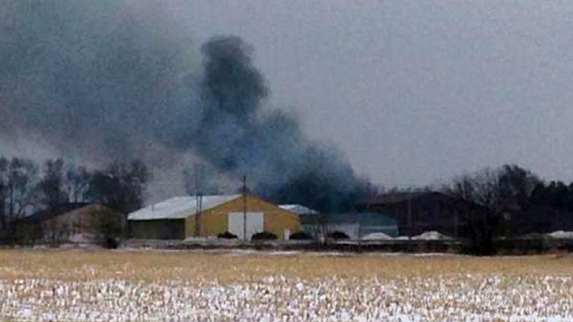 Feb. 20: Smoke rises from a fire in Northwood, Iowa as an evacuation order is in place for Northwood due to a fire at a fertilizer plant at Northwood Municipal Airport.