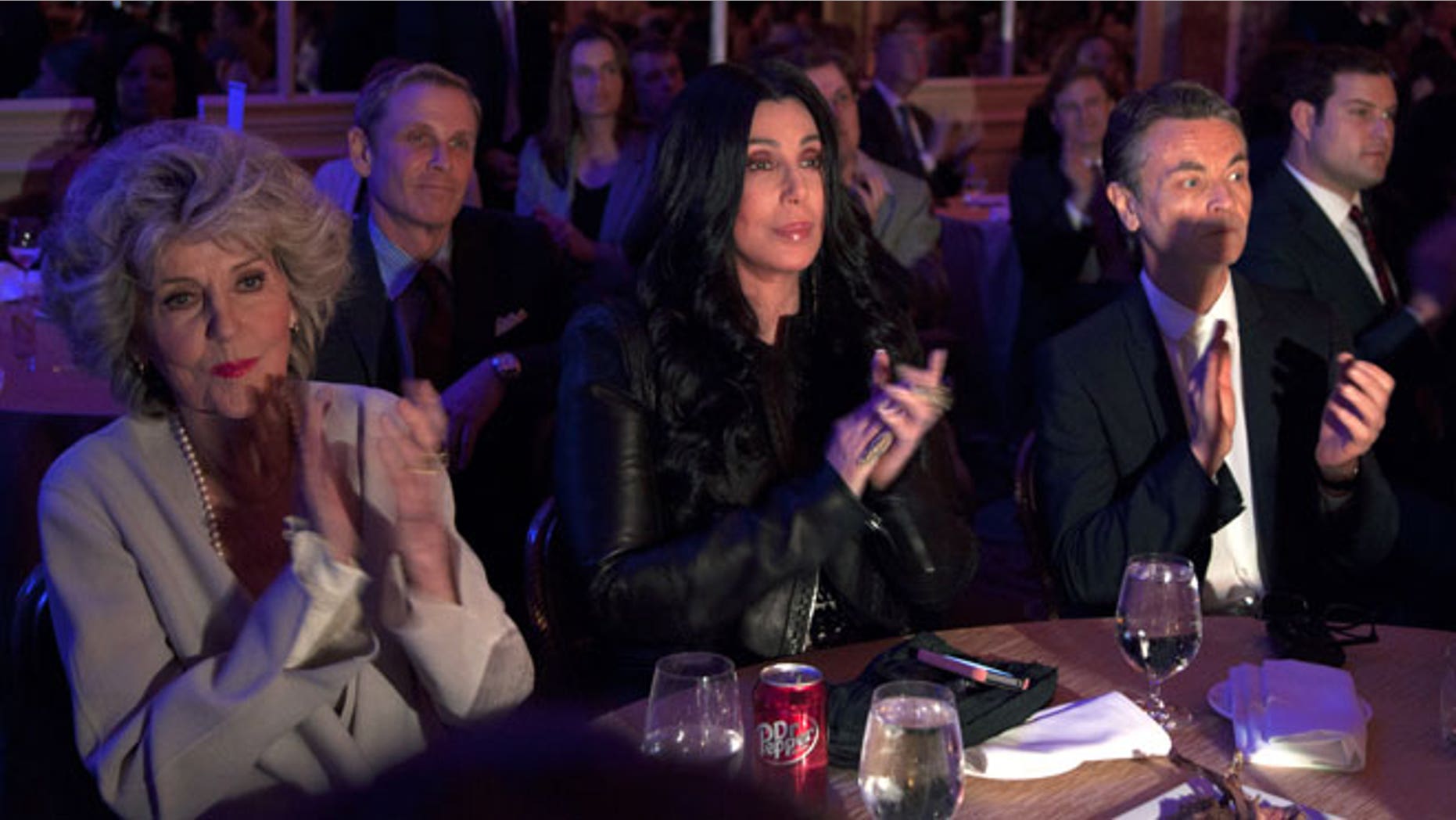 June 6, 2012: Cher looks at the stage and applauds as President Barack Obama speaks at a campaign event at the Beverly Wilshire Hotel, in Los Angeles.