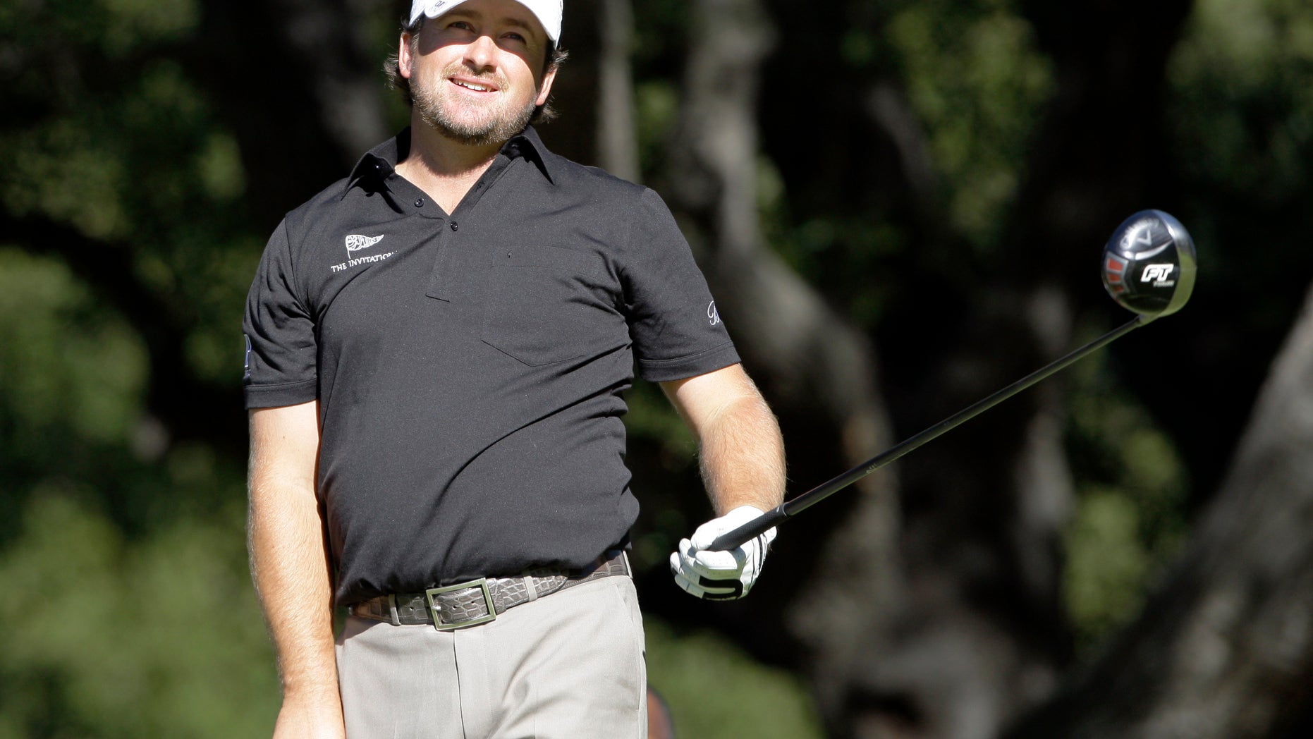 Graeme McDowell, of Northern Ireland, watches his drive on the sixth tee during the Pro-Am round at the Chevron World Challenge golf tournament at Sherwood Country Club in Thousand Oaks, Calif., Wednesday, Dec. 1, 2010. (AP Photo/Reed Saxon)