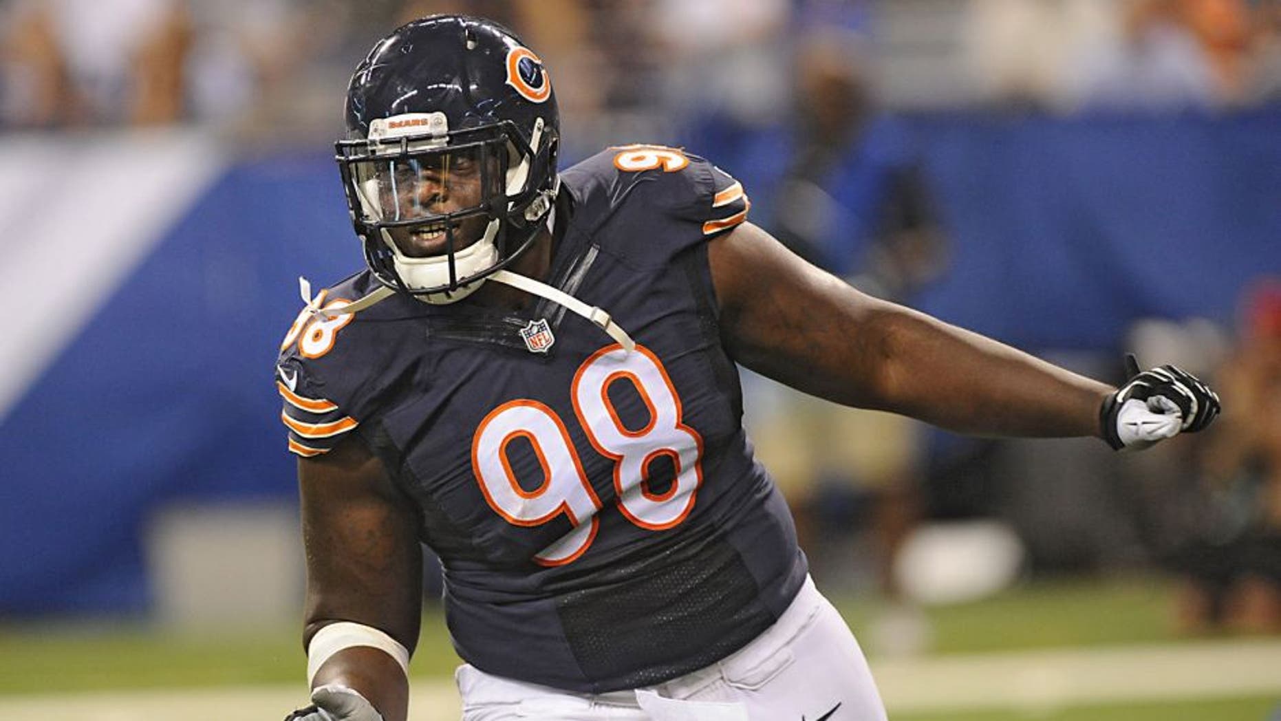 Aug 22, 2015; Indianapolis, IN, USA; Chicago Bears linebacker Brandon Dunn(98) celebrates a fumble recovery against the Indianapolis Colts during a pre season game at Lucas Oil Stadium. Mandatory Credit: Thomas J. Russo-USA TODAY Sports