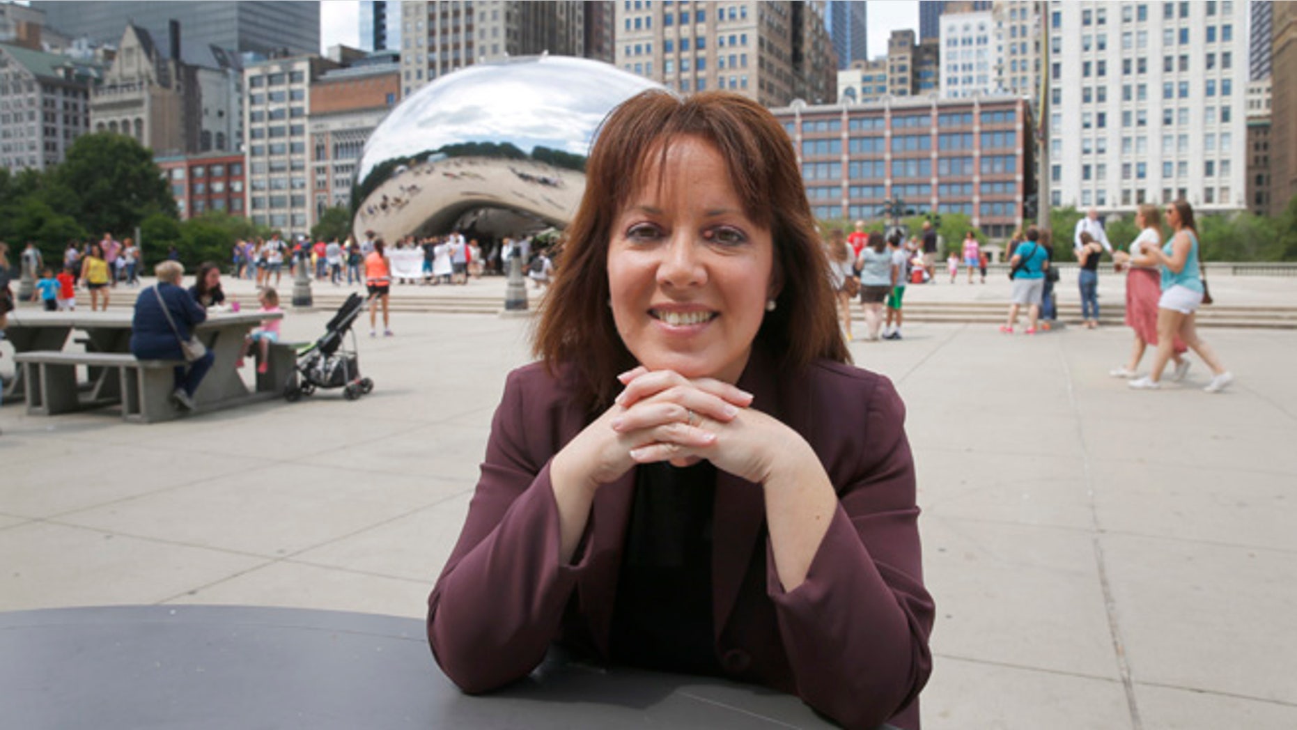 In this photo taken Thursday, June 30, 2016, Friends of the Parks Director Juanita Irizarry poses for a portrait in Chicago's Millennium Park after an interview with the Associated in Chicago. Irizarry heads the obscure nonprofit that stood its ground and blocked Star Wars creator George Lucas' private museum from being built on Chicago's prized lakefront. (AP Photo/Charles Rex Arbogast)