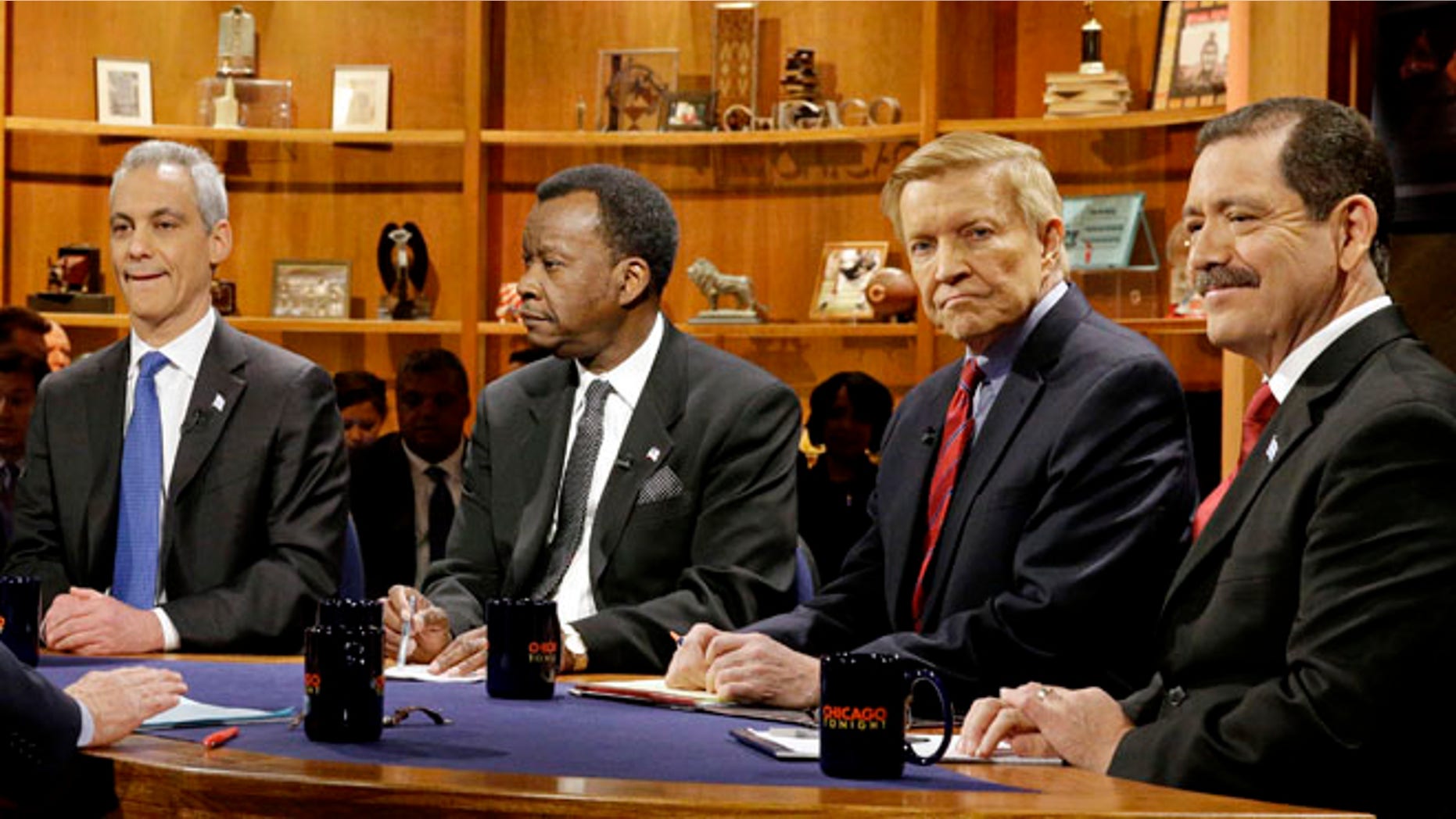 FILE: Feb. 4, 2015: from left, Chicago Mayor Rahm Emanuel, businessman Willie Wilson, Alderman Bob Fioretti, Cook County Commissioner Jesus Garcia in Chicago, Ill.