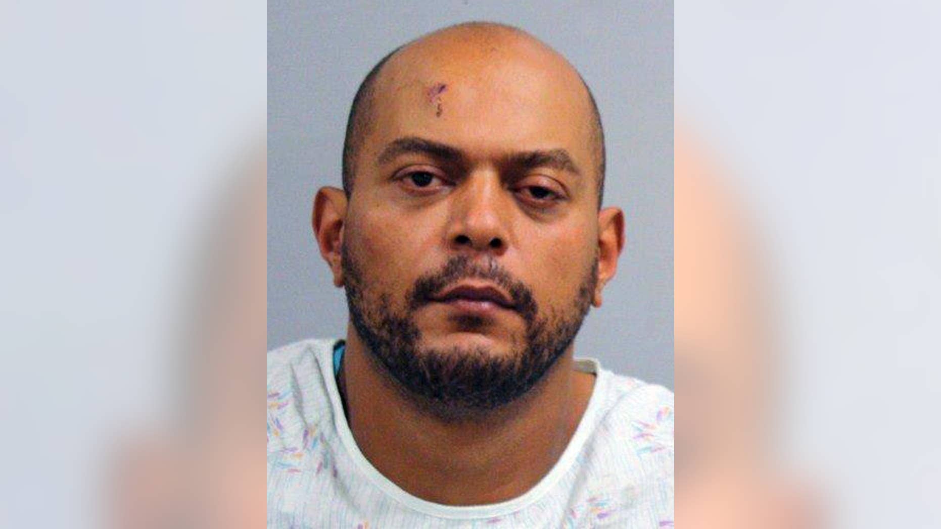This booking photo released by the Bristol, Conn., Police Department shows Arthur Hapgood, of Waterbury, Conn., arrested and charged with murder in the fatal stabbing of his 1-year-old niece Zaniyah Calloway while baby-sitting for her Monday evening, Aug. 18, 2014 in Bristol. He's expected to be arraigned Tuesday in Bristol Superior Court. (AP Photo/Bristol Police Department)