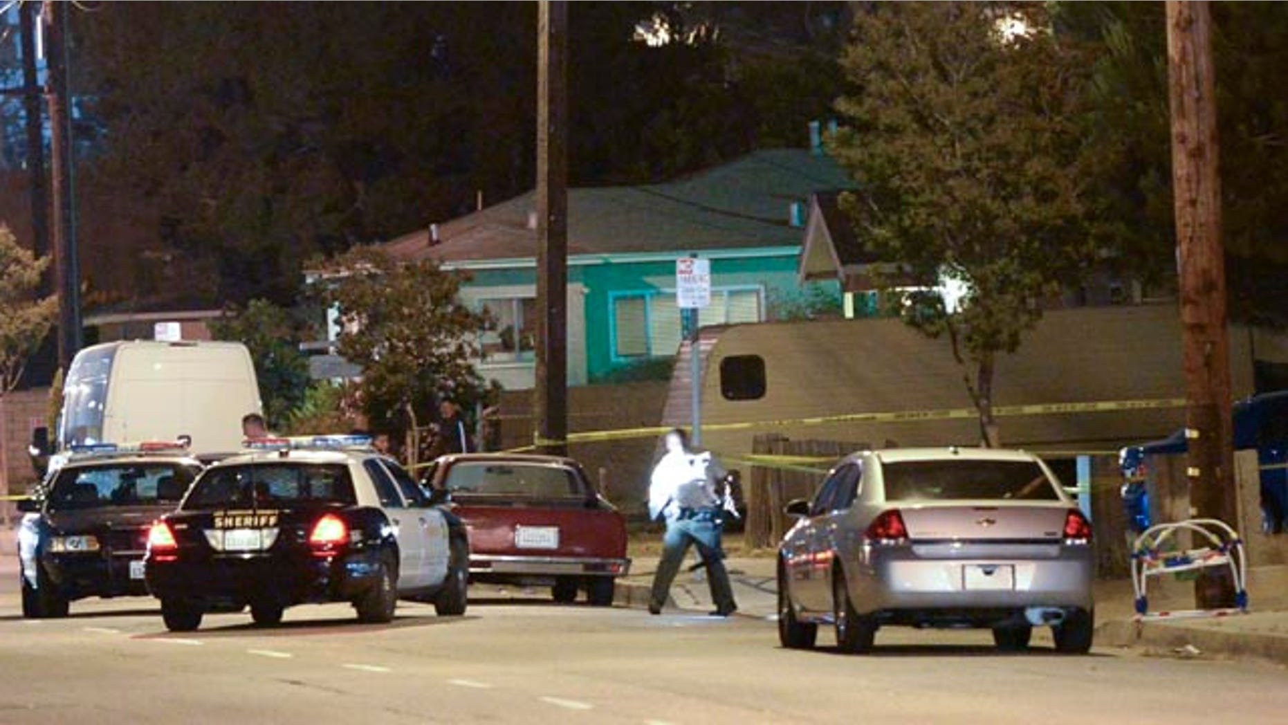 May 20, 2014: Los Angeles County sheriff's deputies block off the scene of a triple homicide that occurred in an unincorporated area of Los Angeles. Carol Coronado, 30, was arrested on suspicion of murder, taken to a hospital for examination and then to a sheriff's station for booking. Authorities say she made no statement. (AP Photo/The Daily Breeze, Steve McCrank)