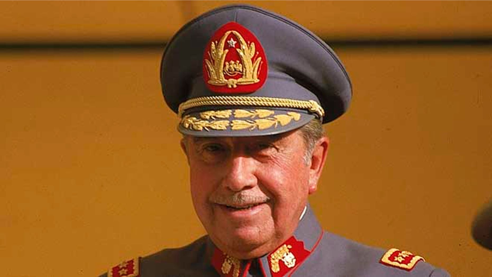 FILE - In this Oct. 1983, file photo, General Augusto Pinochet is seen in Santiago, Chile. Human rights groups and families of victims believe that military pacts of silence that hushed up many of the atrocities committed during the rule of Gen. Pinochet may finally be unraveling. (AP Photo/Eduardo Di Baia, File)