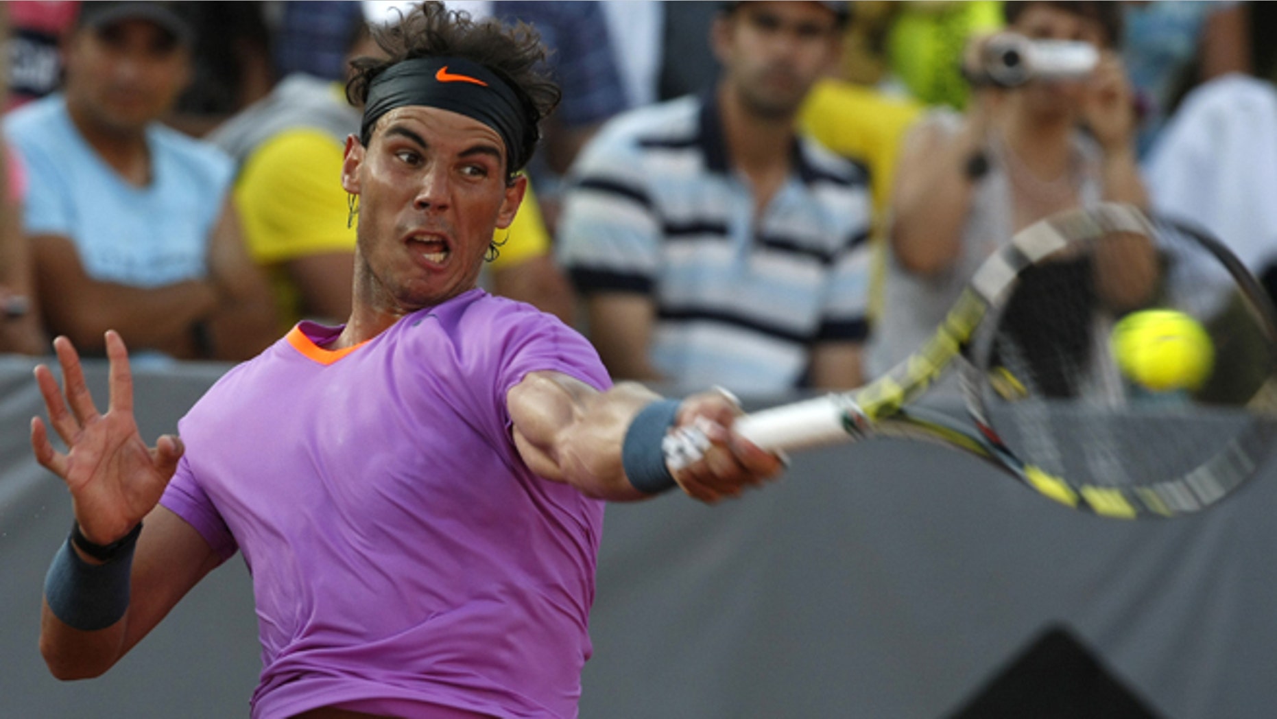 Spain's Rafael Nadal returns the ball to Spain's Daniel Gimeno-Traver during a VTR Open tennis match in Vina del Mar, Chile, Friday, Feb. 8, 2013. Rafael Nadal was putting himself through a twin workout on Friday to test his sore left knee, defeating fellow Spaniard Daniel Gimeno-Traver 6-1, 6-4 to reach the semifinals of the VTR Open.(AP Photo/Luis Hidalgo)