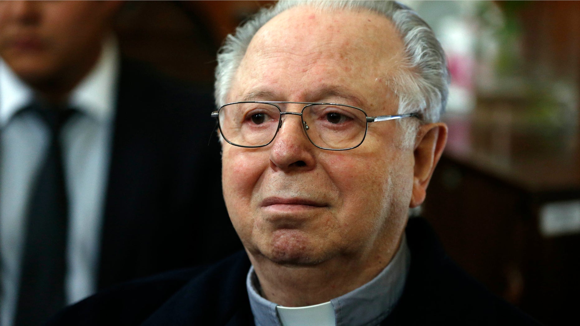 Fernando Karadima, Chileâs most infamous pedophile priest, sits in court before testifying in a case that three of his victims brought against the countryâs Catholic Church in Santiago, Chile, Wednesday, Nov. 11, 2015. The Vatican ordered Karadima to life of penance and prayer in 2011 for abusing three young boys. A local judge determined the abuse allegations were truthful but absolved Karadima because the time limit had expired for prosecution. The three victims who filed the suit accuse the Chilean Catholic church of a cover up. The church has rejected the accusation. (AP Photo/Luis Hidalgo)
