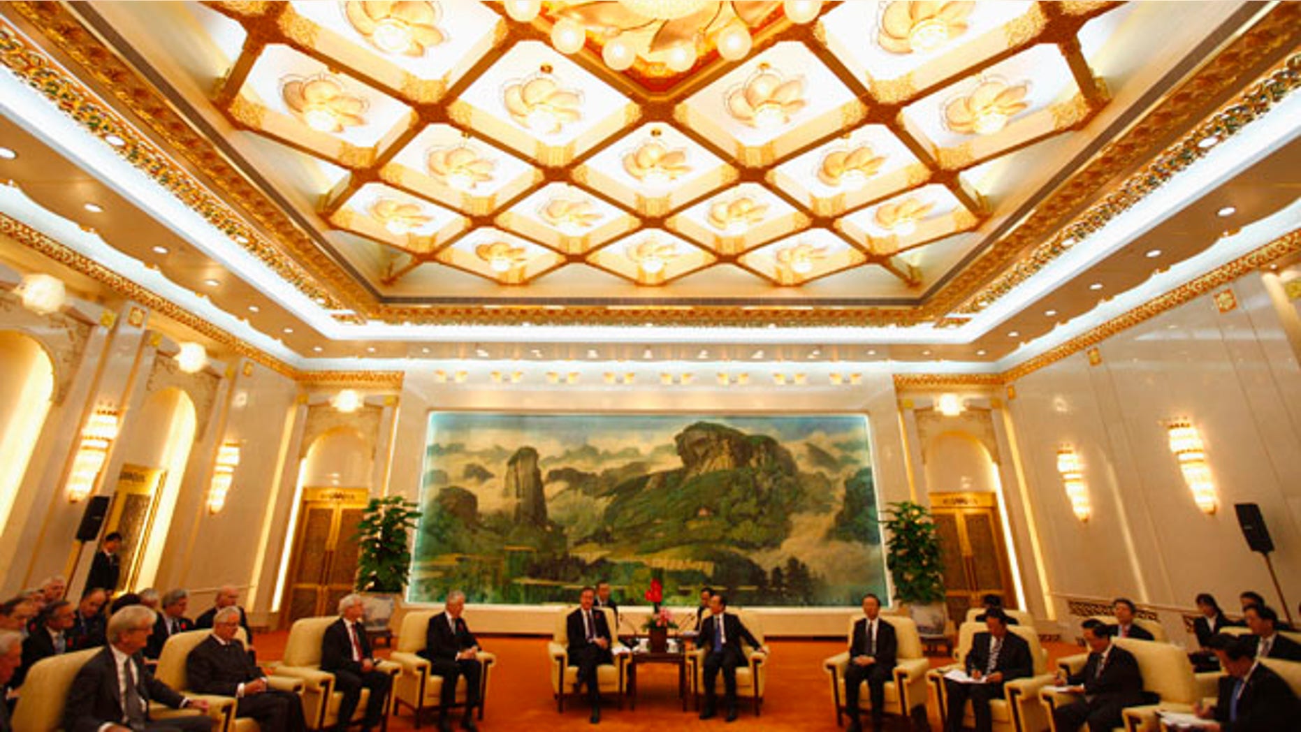 Nov. 9: Britain's Prime Minister David Cameron, center left, and China's Premier Wen Jiabao, center right, attend a meeting with British industrial and commercial business delegates at the Great Hall of the People in Beijing, China.