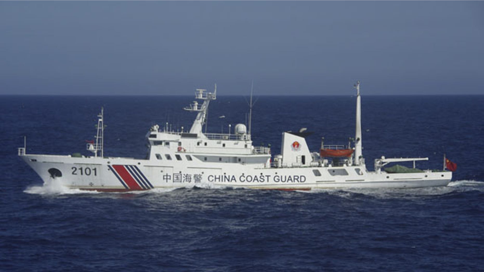 July 24, 2013: In this photo released by Japan's 11th Regional Coast Guard, a China Coast Guard ship numbered 2101 sails in waters 66 kilometers (41 miles) from the East China Sea islands called Senkaku by Japan and Diaoyu by China (AP Photo/Japan's 11th Regional Coast Guard)