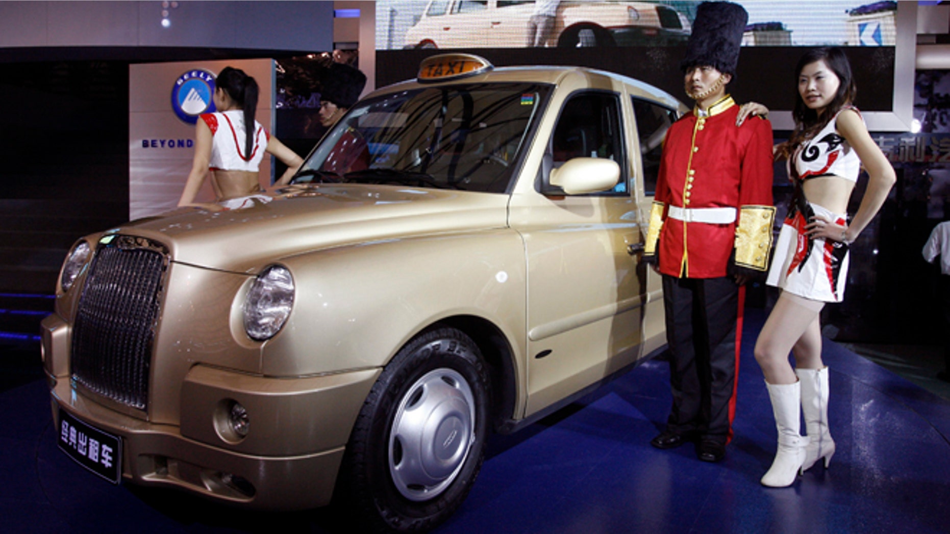 In this photo taken Saturday, April 21, 2007, the TX4 London cab built under a joint venture company between Manganese Bronze Holdings Plc and Geely Automobile Holdings Limited and Shanghai Maple is unveiled during the Shanghai Auto 2007 held in Shanghai, China. The Chinese automaker that bought Sweden's Volvo Cars in 2010 has acquired the British manufacturer of the distinctive London cab. Geely Holding Group said Friday, Feb 1, 2013 it bought Manganese Bronze Holdings out of bankruptcy court administration. Geely said it paid just over 11 million pounds ($17.5 million).(AP Photo/Ng Han Guan)