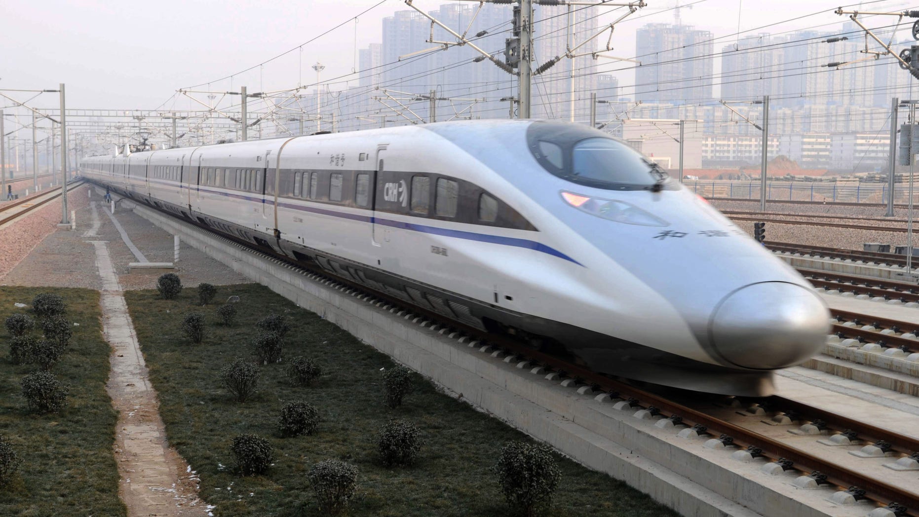 Dec. 26, 2012: In this photo released by China's Xinhua news agency, a high-speed train G802 leaves for Beijing from Shijiazhuang, capital of north China's Hebei Province.