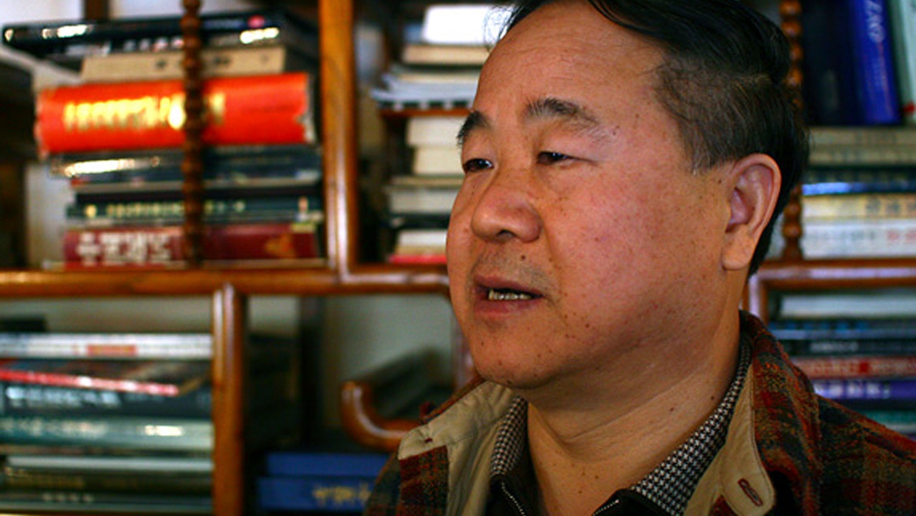 In this photo taken Monday, Oct 22, 2007, Chinese writer Mo Yan speaks during an interview at a teahouse in Beijing. Mo won the Nobel Prize for literature Thursday, Oct. 11, 2012. (AP Photo/Aritz Parra)