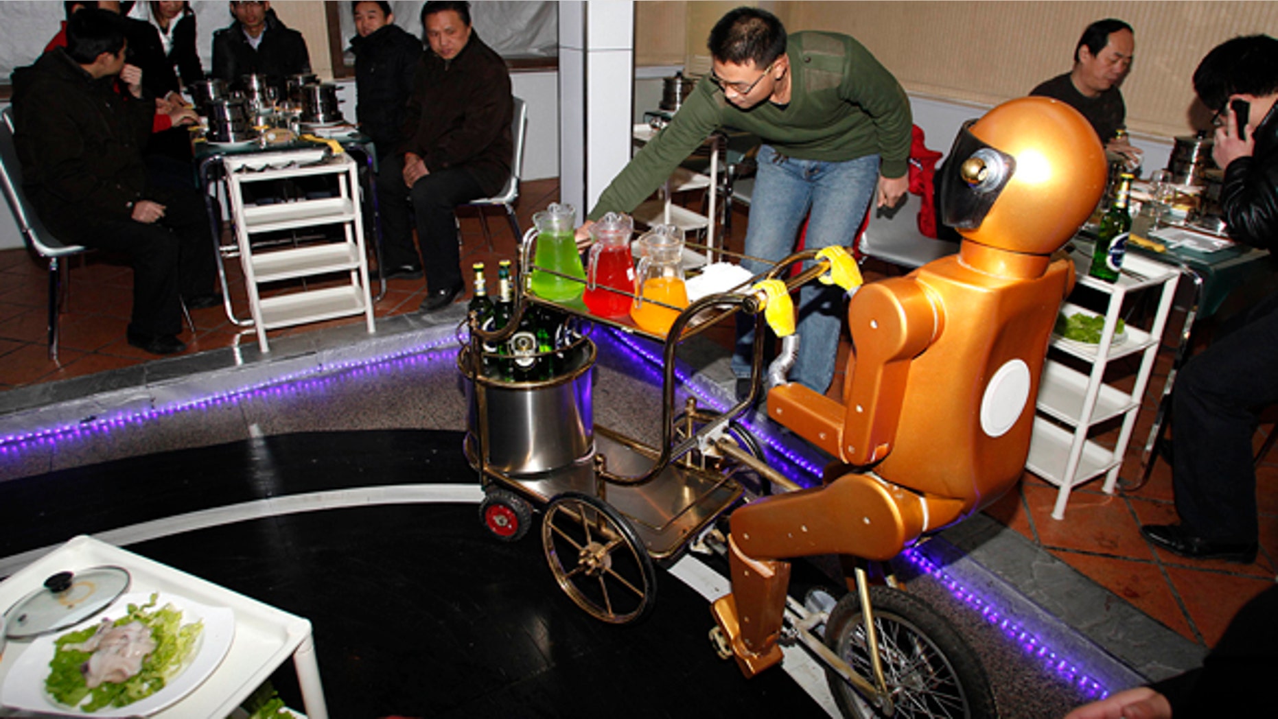 Service with a smile also comes with an electronic voice at the Dalu Robot restaurant, where the hotpot meals are not as famous yet as the staff -- who never lose their patience and never take tips.