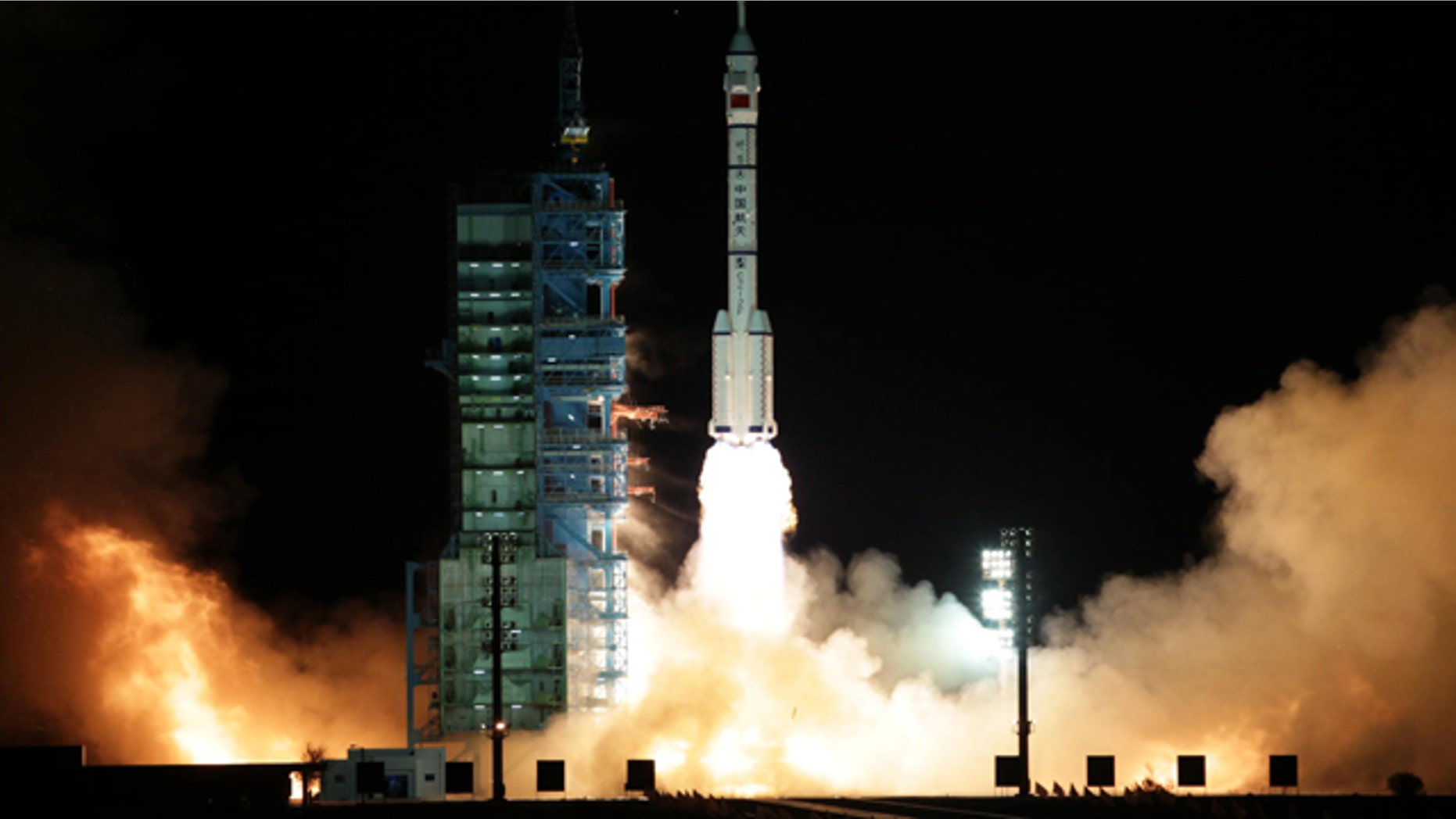 Nov. 1, 2011: A modified model of the Long March CZ-2F rocket carrying the unmanned spacecraft Shenzhou-8 blasts off from the launch pad at the Jiuquan Satellite Launch Center in northwest China's Gansu Province, the Chinese state media reported. It is the latest step in what will be a decade-long effort by China to place a manned permanent space station in orbit.
