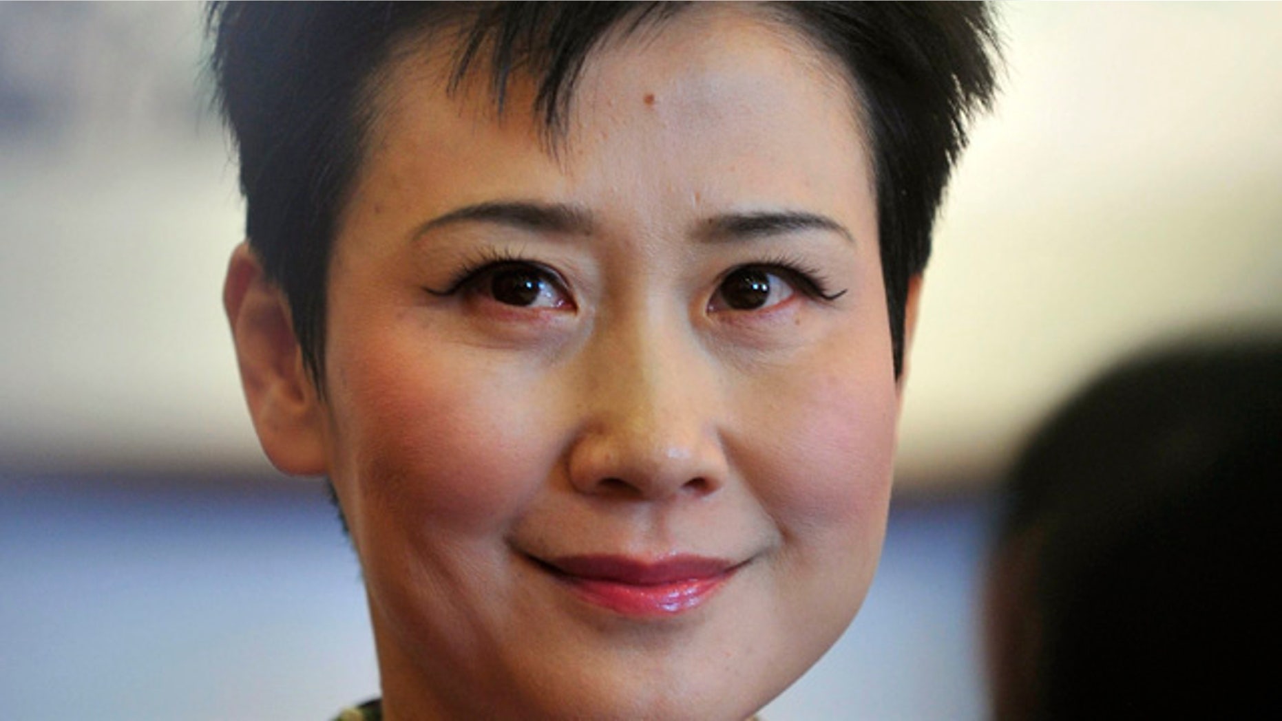March 4, 2011: Li Xiaolin, chairwoman of the state-owned electricity giant China Power International Development Ltd., attends the Chinese People's Political Consultative Conference (CPPCC) in Beijing. Li, daughter of former Chinese Premier Li Peng, held as much as $2.48 million in a secret HSBC account in Switzerland, the International Consortium of Investigative Journalists has found. (AP Photo)
