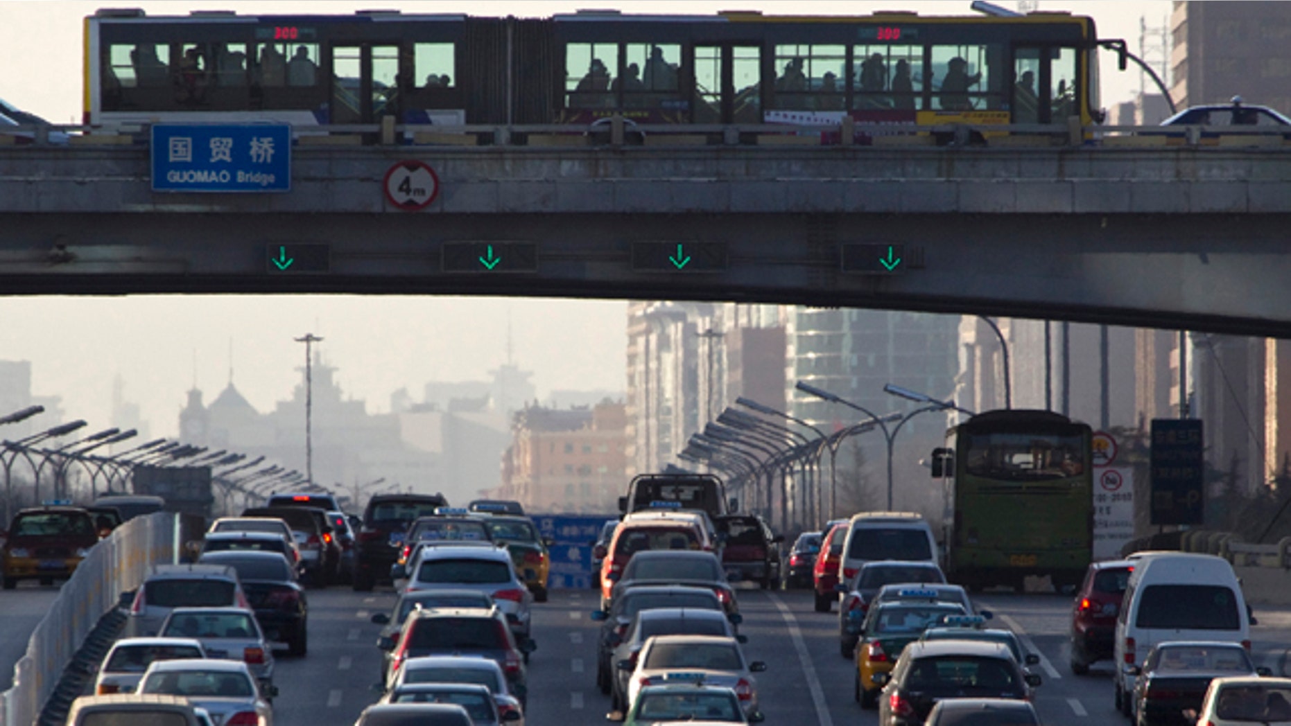 Dec. 23, 2010: Vehicles pack the main roads during the day in central Beijing, China.