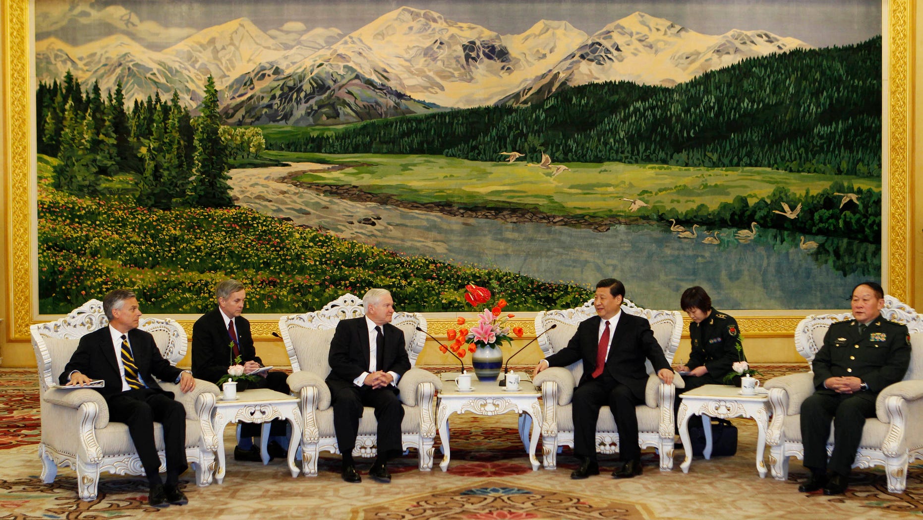 Jan. 10, 2011: U.S. Secretary of Defense Robert Gates, third from left, and Chinese Vice President Xi Jinping, third from right, sit with members of their delegation during a meeting at the Great Hall of the People in Beijing. (AP)