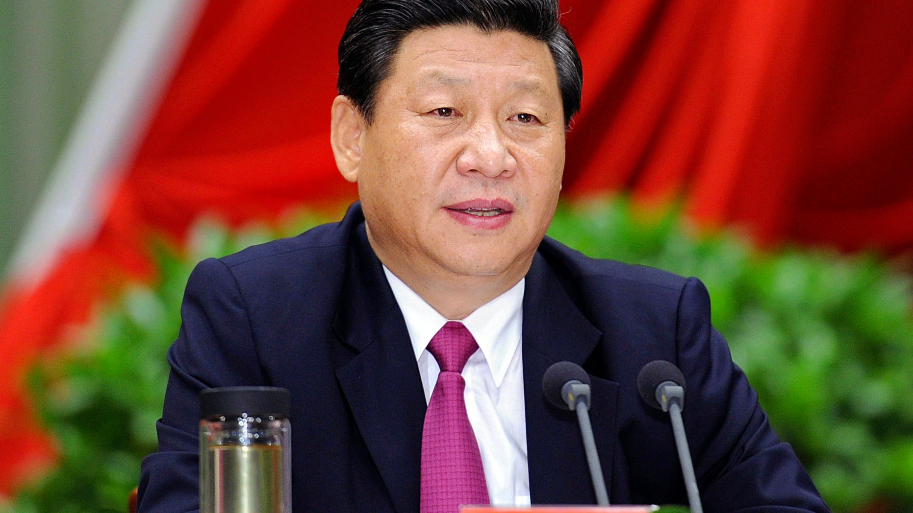 In this photo taken Sept. 1, 2012 and released by China's Xinhua News Agency, Chinese Vice President Xi Jinping addresses the opening ceremony of the autumn semester of the Party School of the Communist Party of China in Beijing. Chinese micro-bloggers and overseas websites have come up with all kinds of creative speculation as to why President-in-waiting Xi has gone unseen for more than a week. (AP Photo/Xinhua, Li Tao) NO SALES