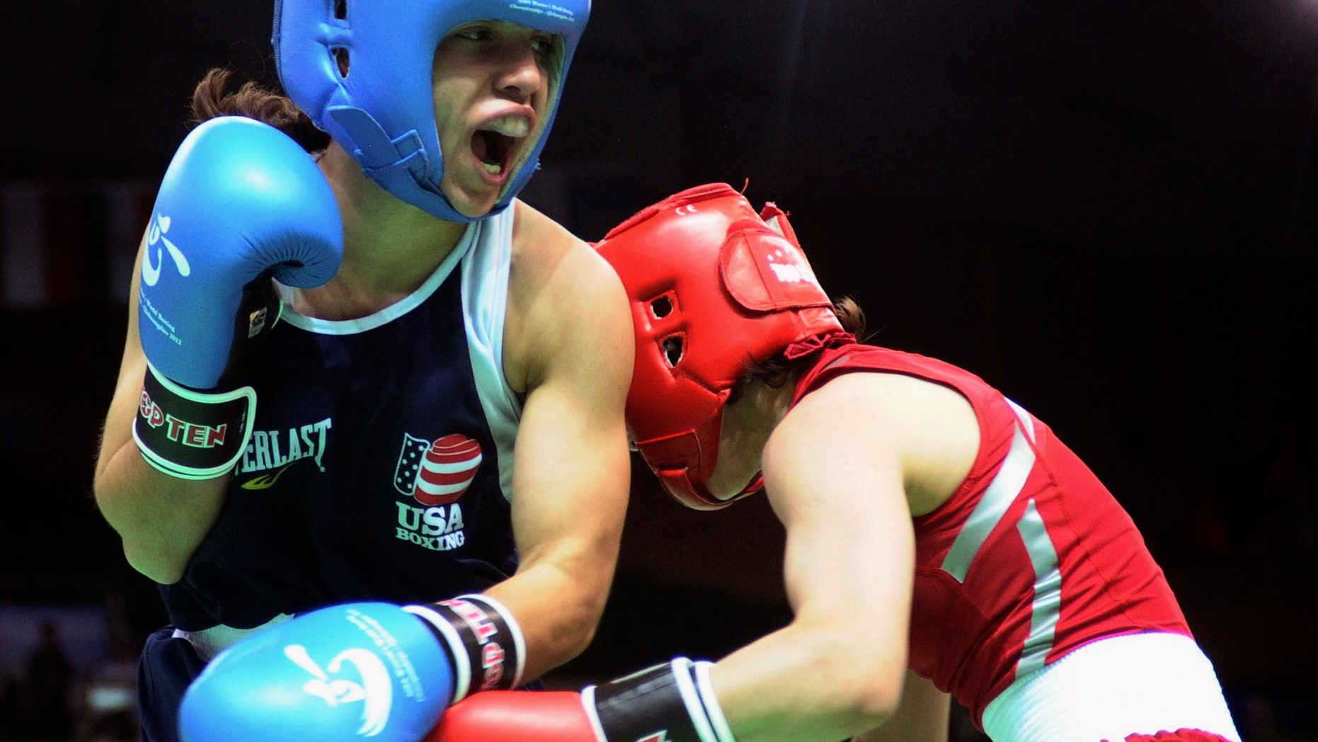 May 15, 2012: Marlen Esparza of the United States, left, fights with Thi Duyen Luu of Vietnam during their women's flyweight category preliminary match of the AIBA World Women's Boxing Championships in Qinhuangdao, north China's Hebei province.