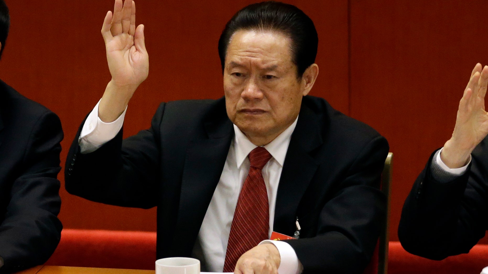 Nov. 14, 2012 - FILE photo of Zhou Yongkang, the then Chinese Communist Party Politburo Standing Committee member in charge of security, during the 18th Communist Party Congress in Beijing, China. China's official Xinhua News Agency says the country's former security chief, Zhou Yongkang, has been expelled from the Communist Party.