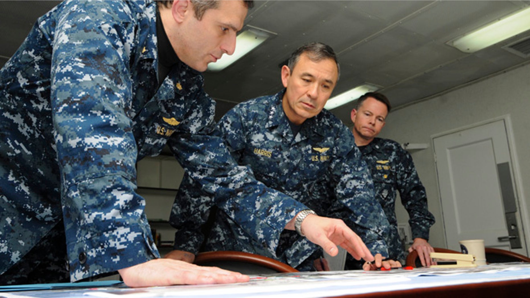 FILE 2011: Defense Secretary Voltaire Gazmin said the commander, Adm. Harry Harris Jr., center, assured him of U.S. readiness to provide assistance.