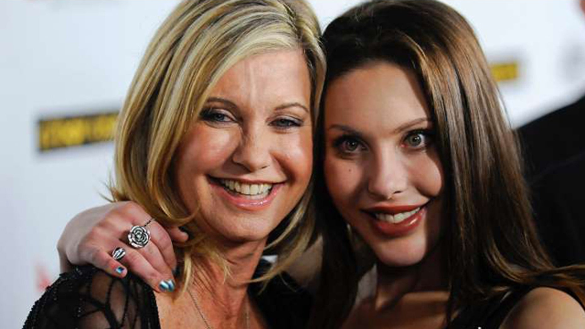 Oct. 8, 2015: Olivia Newton-John and daughter Chloe Lattanzi are pictured promoting Lattazi's single "You Have to Believe", a cover of Newton-John's 1980 hit "Magic" (Reuters/Gus Ruelas)
