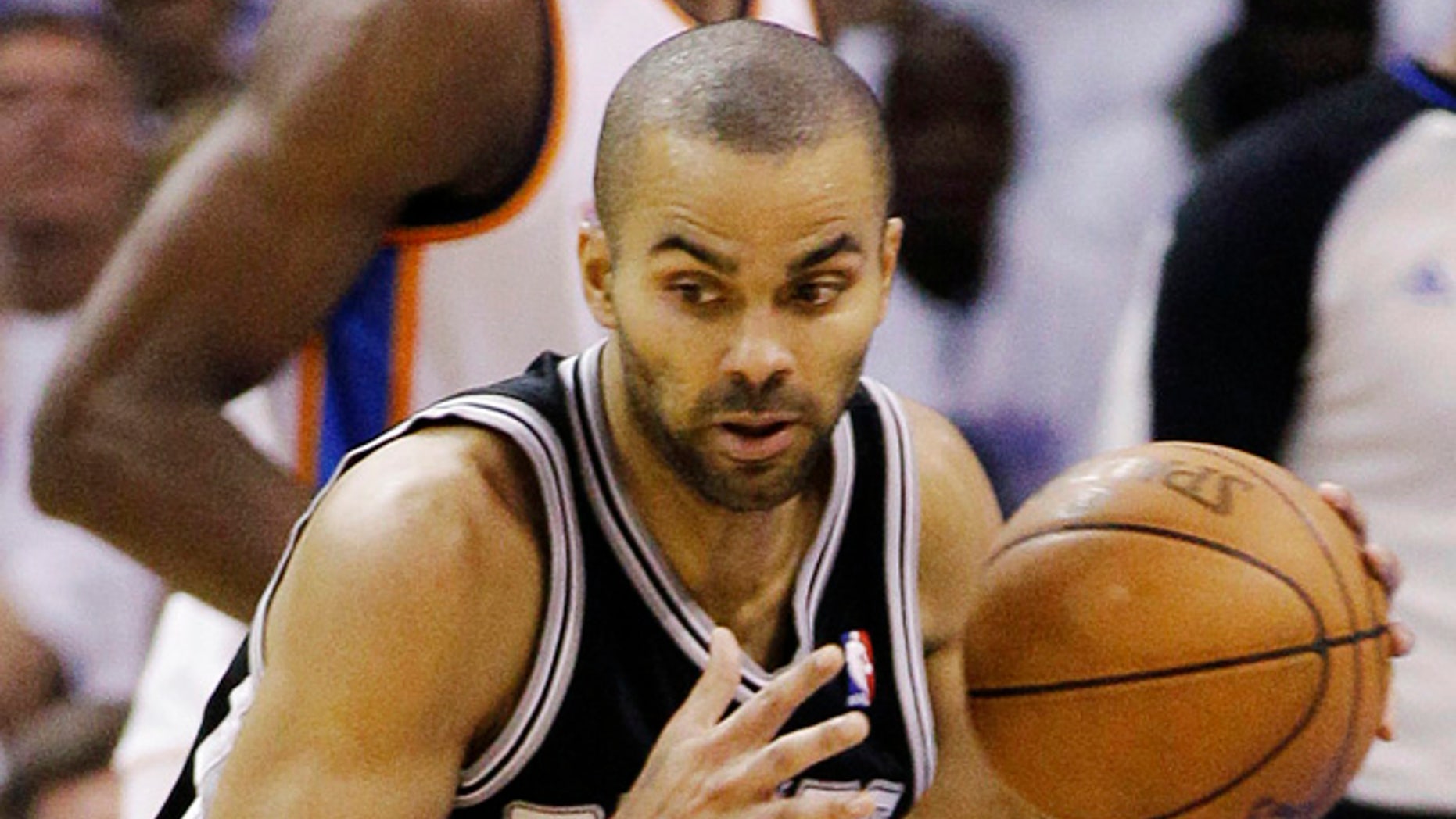 June 6, 2012: In this file photo, San Antonio Spurs point guard Tony Parker (9), of France, takes the ball downcourt past Oklahoma City Thunder small forward Kevin Durant during the first half of Game 6 in the NBA basketball Western Conference finals, in Oklahoma City.