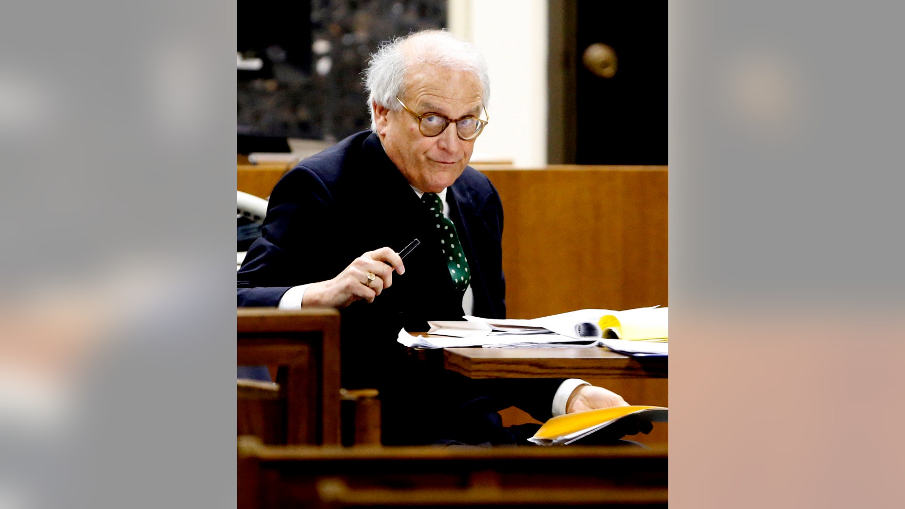 Jim Berry, attorney for 17-year-old Chancey Luna, sits in the courtroom Thursday, April 16, 2015, in Duncan, Okla. Luna is accused of first-degree murder for the shooting of Australian baseball player Chris Lane. (Steve Sisney/The Oklahoman via AP)