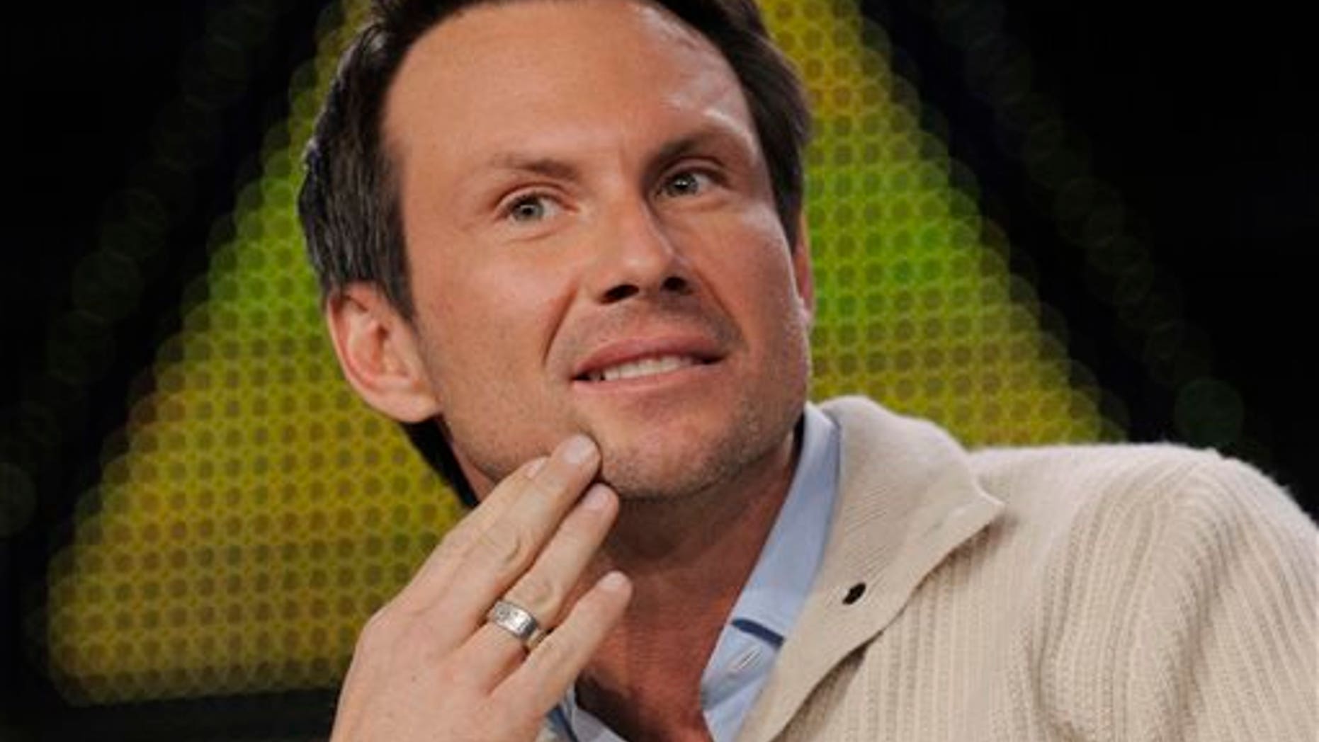 FILE - In this Jan. 11, 2011 file photo, Christian Slater, a cast member in the FOX series "Breaking In," is pictured during the FOX Broadcasting Company Television Critics Association winter press tour in Pasadena, Calif. Slater has married his girlfriend at an impromptu ceremony. Slater's spokeswoman said the 44-year-old actor wed his girlfriend of three years, Brittany Lopez, on Monday, Dec. 2, 2013, at the courthouse in Coral Gables, Fla. (AP Photo/Chris Pizzello, File)