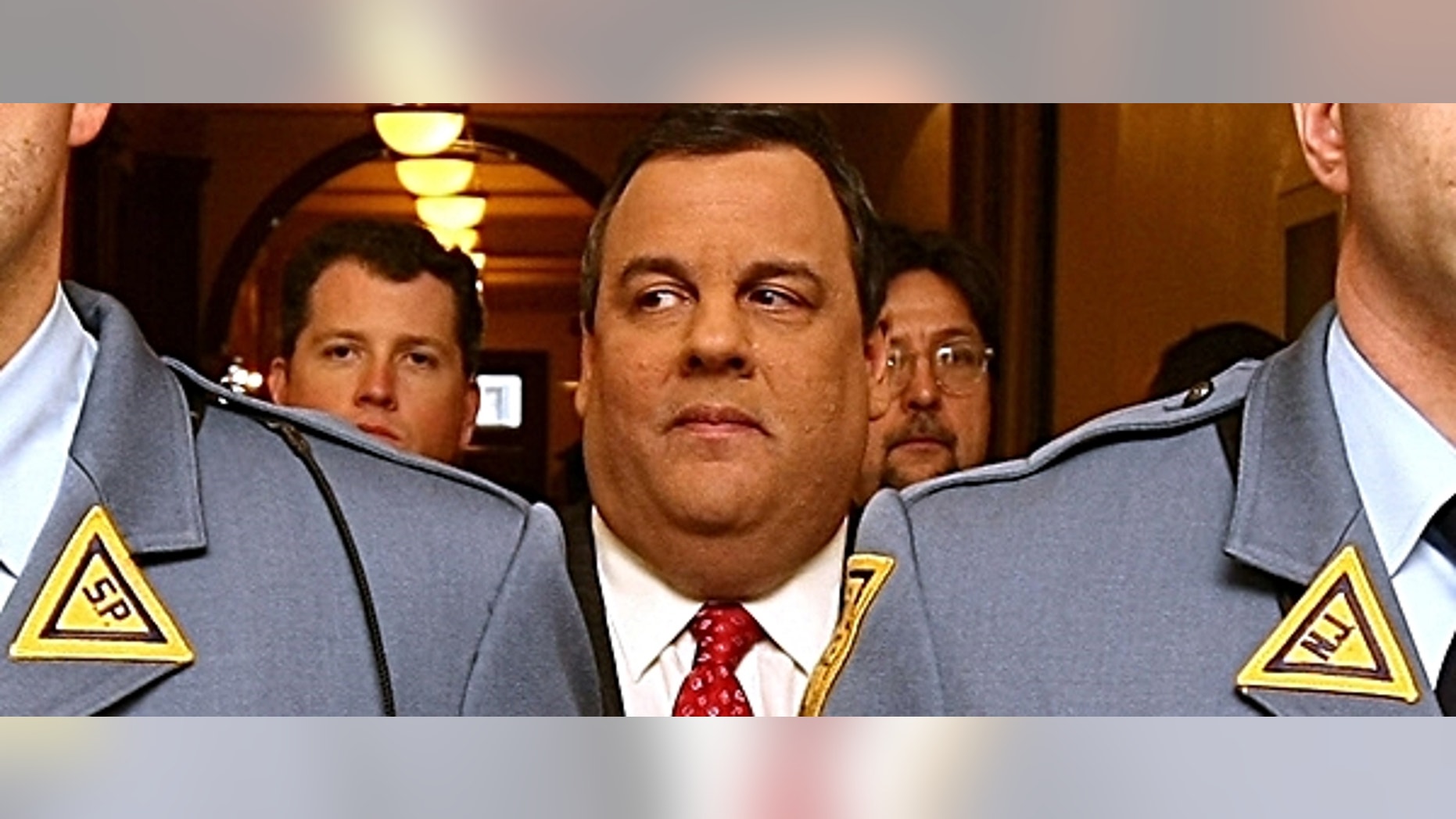 Governor Chris Christie makes his way down to the Assembly Chambers to give the State of the State Address at the Statehouse in Trenton, N.J. on Tuesday, Jan. 8, 2013. (Governor's Office/Tim Larsen)
