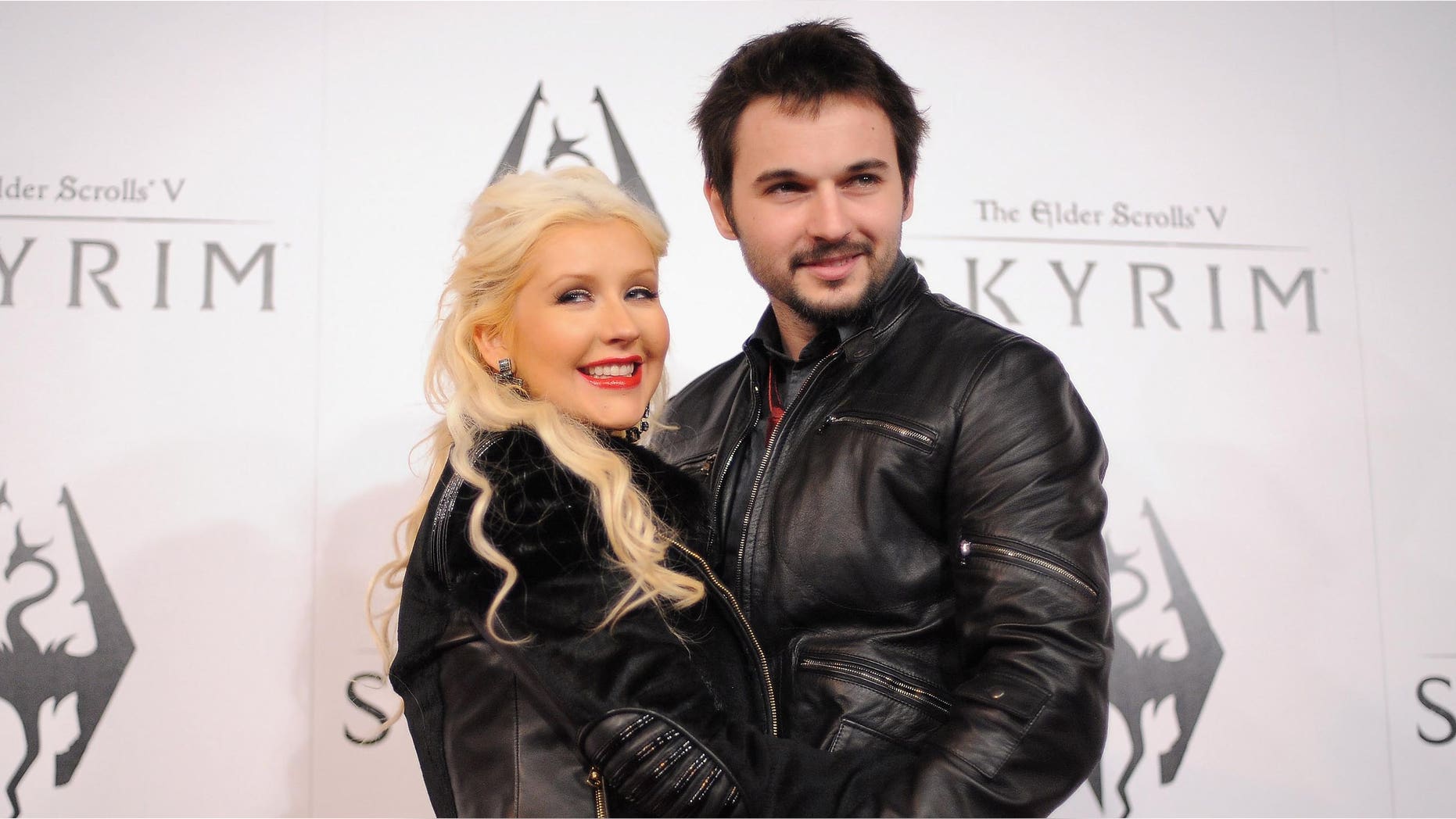 LOS ANGELES, CA - NOVEMBER 08: Singer Christina Aguilera and Matt Rutler arrive at the official launch party for the most anticipated video game of the year, The Elder Scrolls V: Skyrim, at the Belasco Theatre on November 8, 2011 in Los Angeles, California. (Photo by Jordan Strauss/Getty Images for Bethesda)
