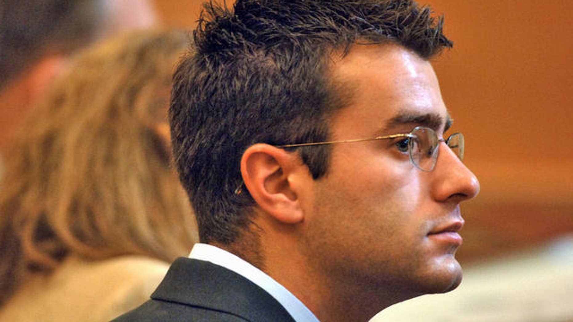 Defendant Christopher Porco listens to the proceedings in the Orange County Courthouse in Goshen, N.Y. on Thursday July 6, 2006.