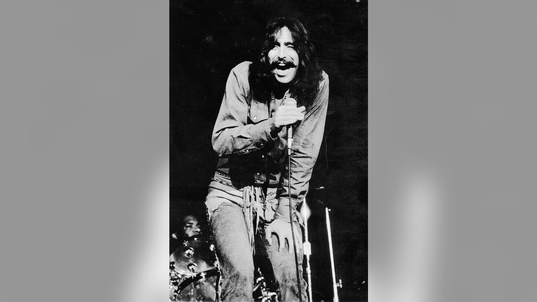 Singer Chuck Negron performing with Three Dog Night.
