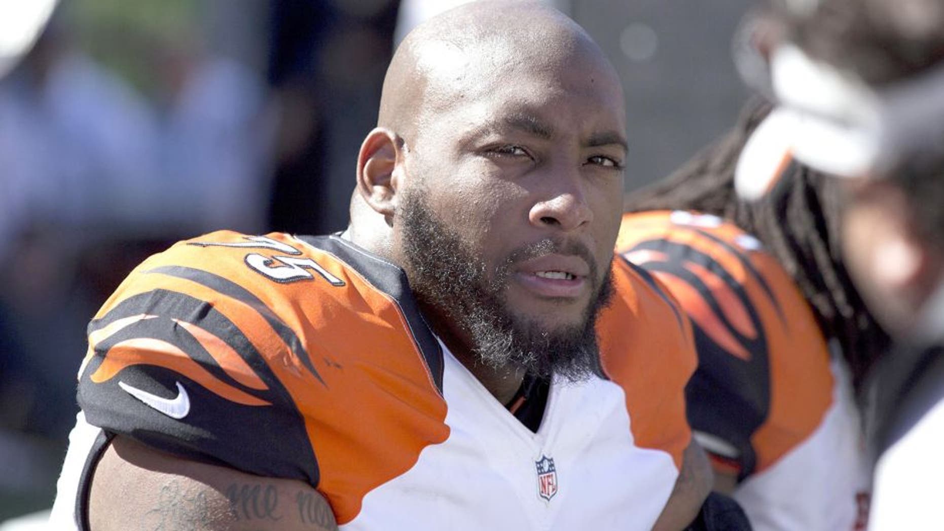 Sep 14, 2014; Cincinnati, OH, USA; Cincinnati Bengals defensive tackle Devon Still (75) looks on from the sidelines in the second half against the Atlanta Falcons at Paul Brown Stadium. The Bengals won 24-10. Mandatory Credit: Aaron Doster-USA TODAY Sports